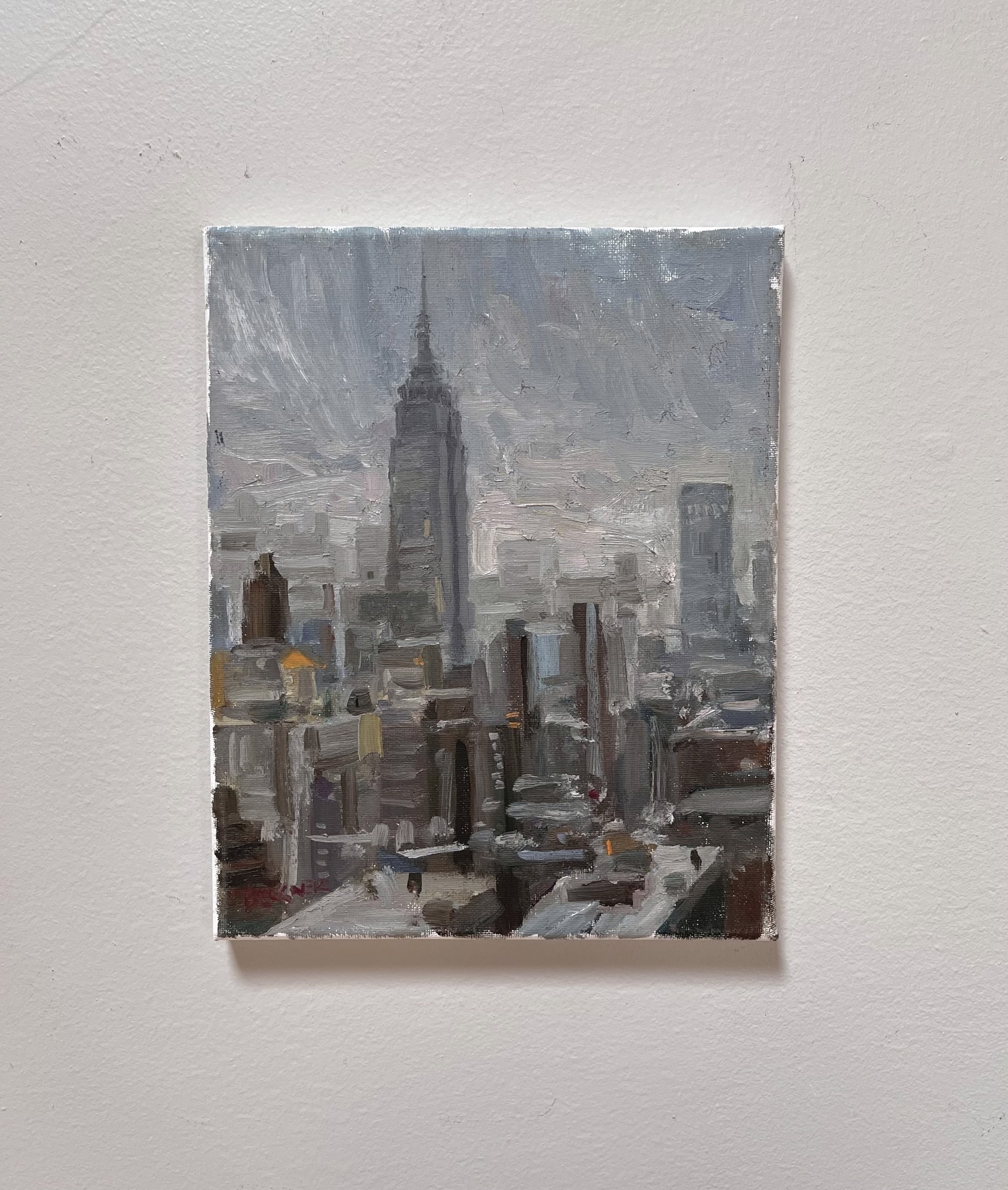 A painting of the Empire State Building in New York City.