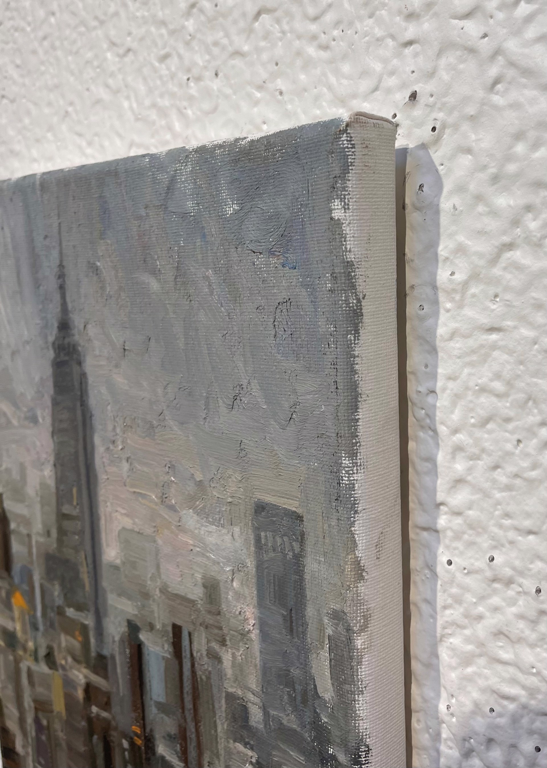 A painting of the Empire State Building in New York City.