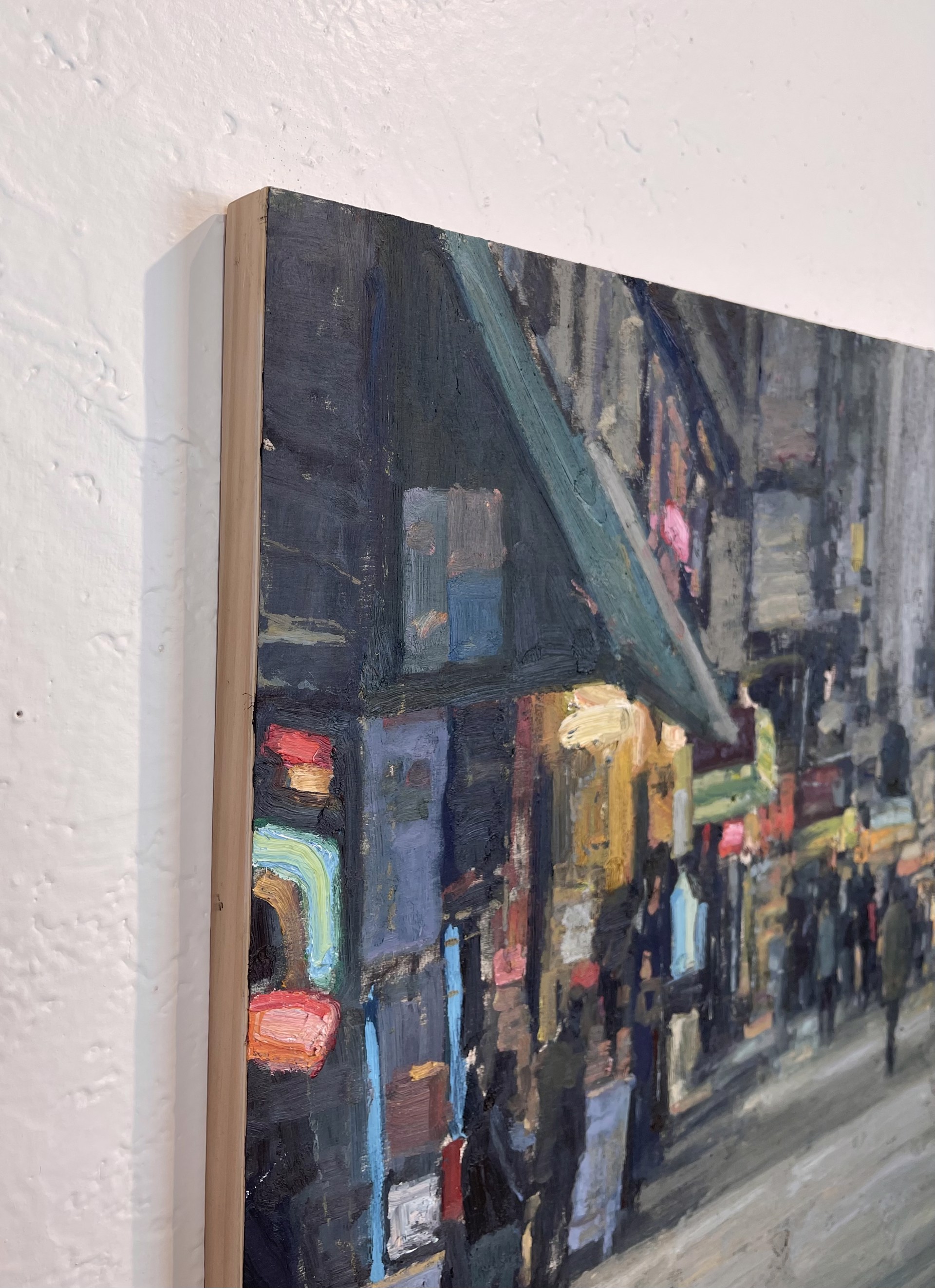 A painting of people walking down a city street.