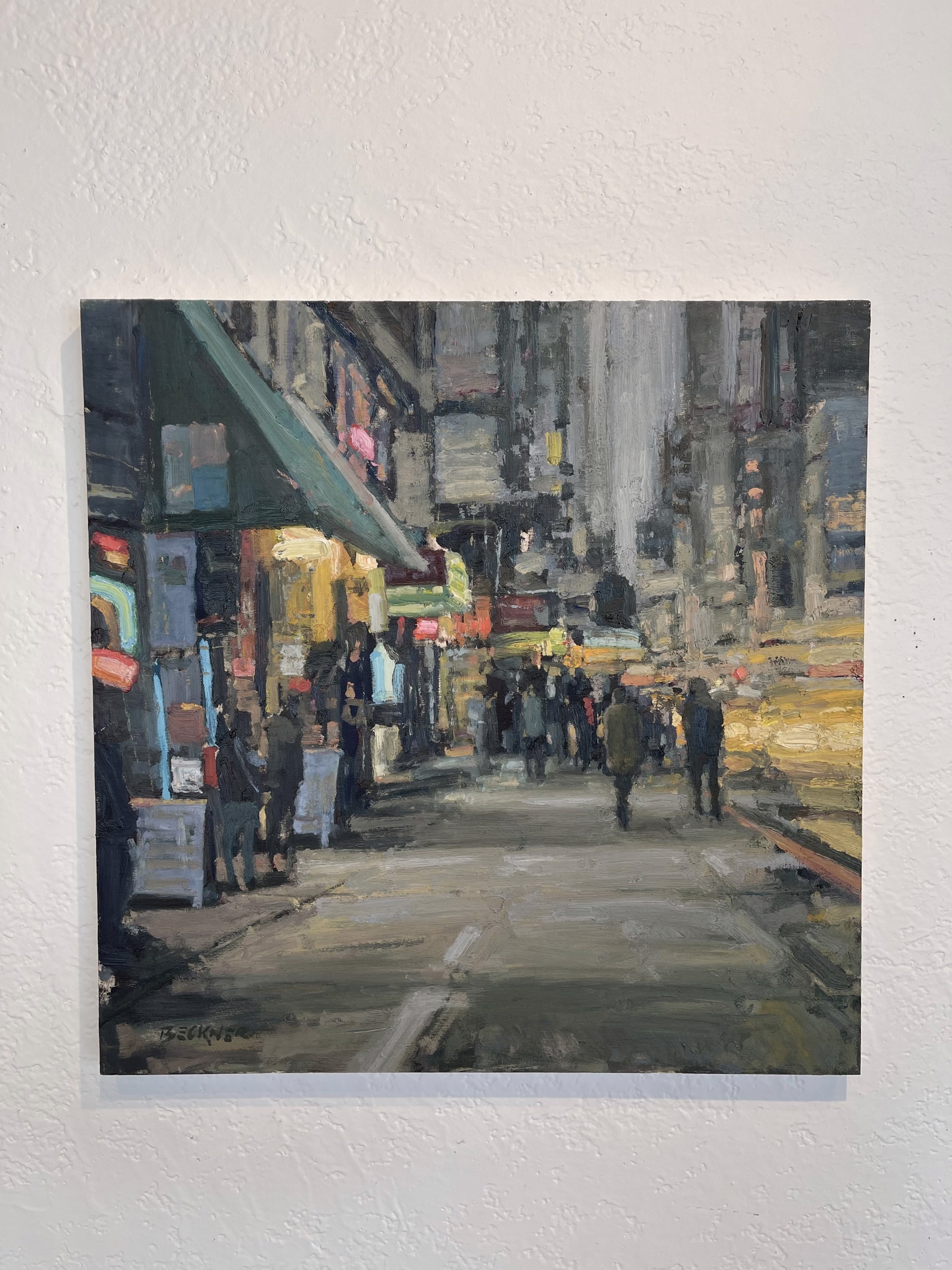A painting of people walking down a city street.