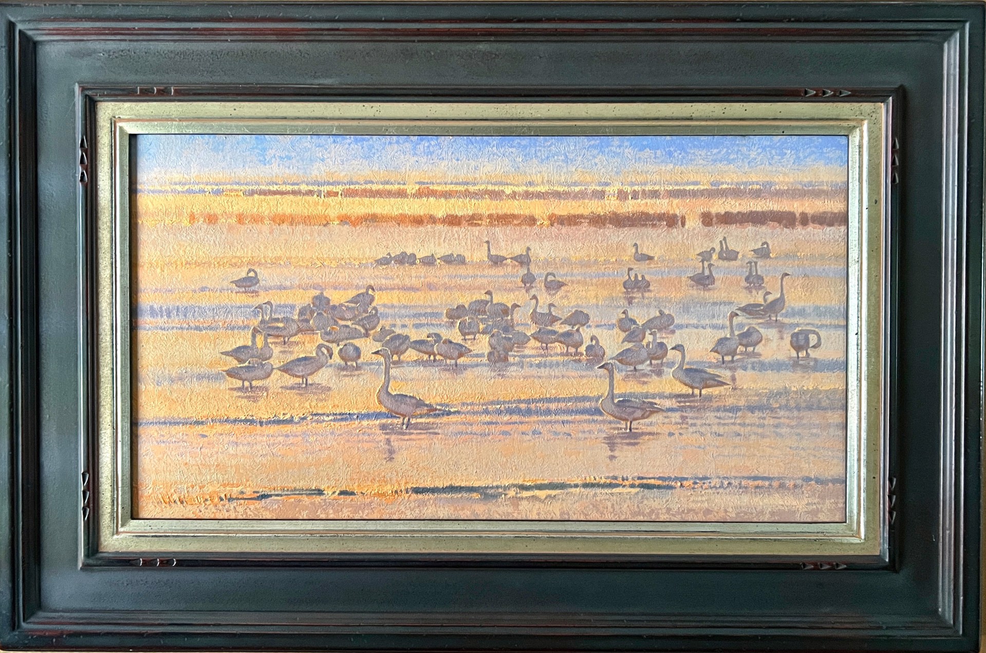 A painting of a flock of geese on a beach at sunset.