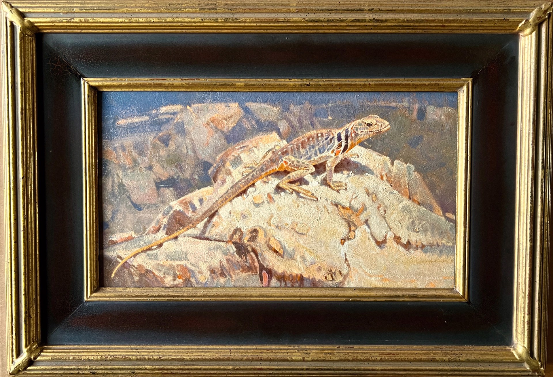 A painting of a lizard sitting on a rock.