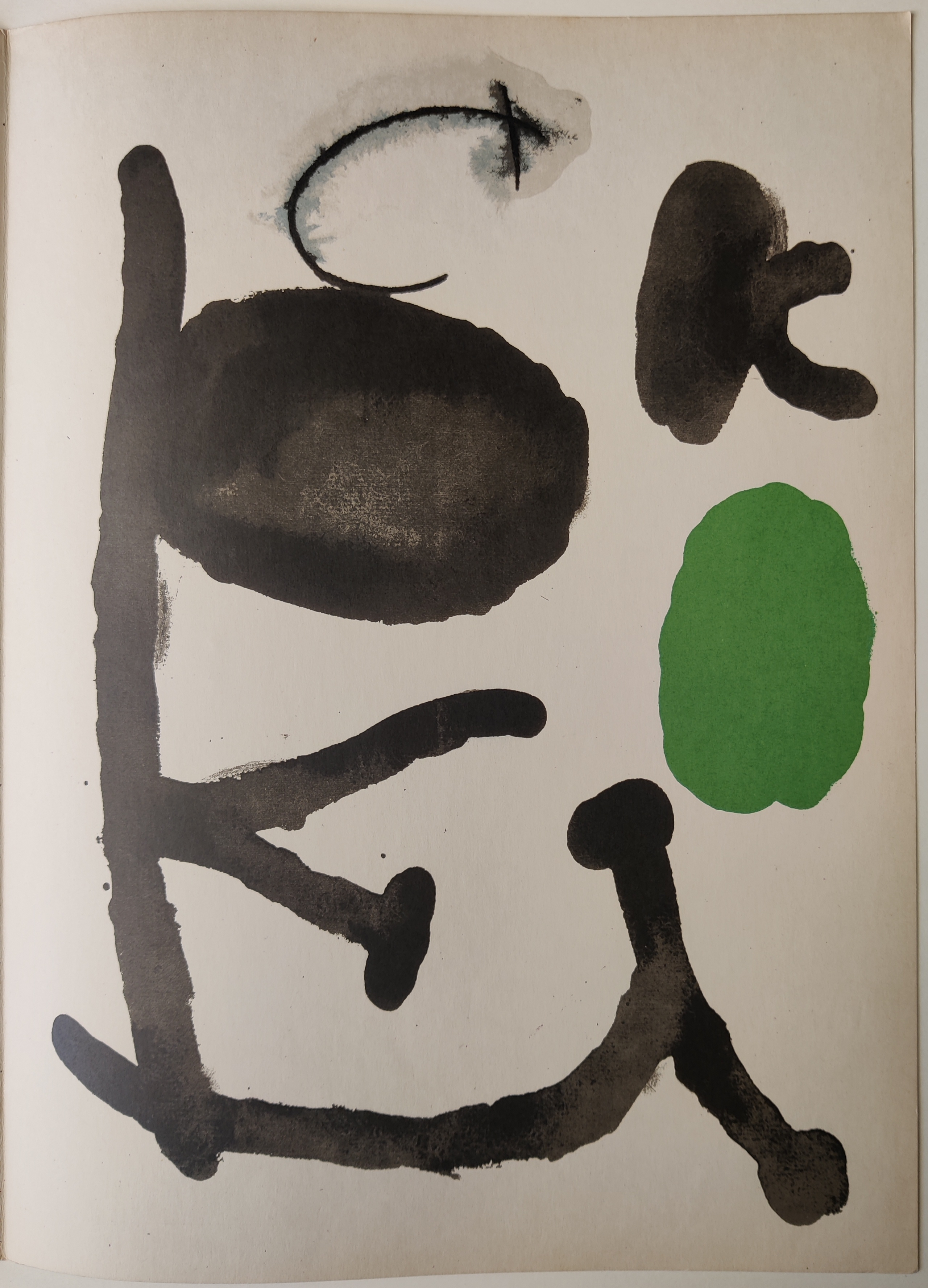A black and green painting on a white background.