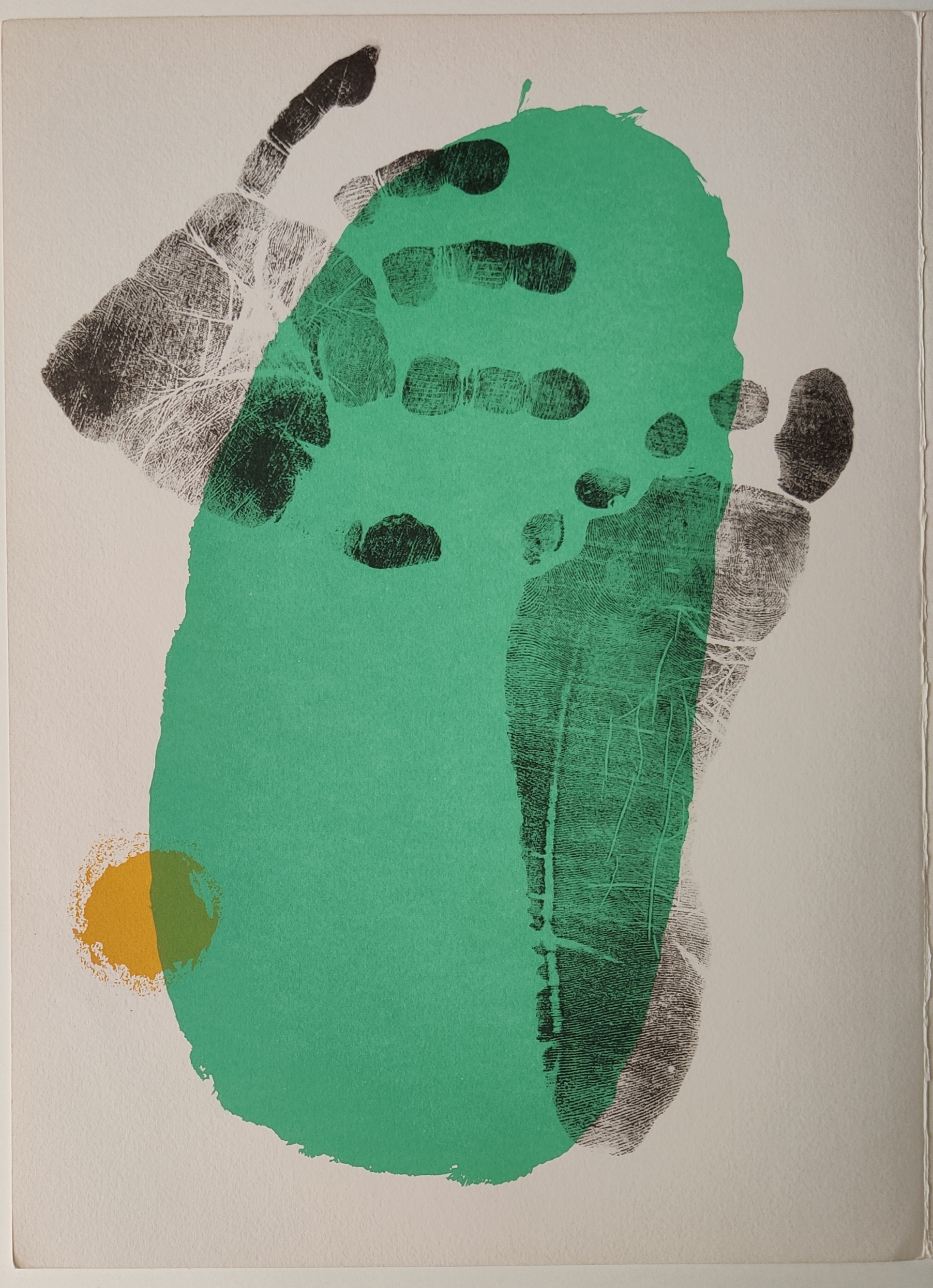 A green and yellow print of a handprint on a white background.