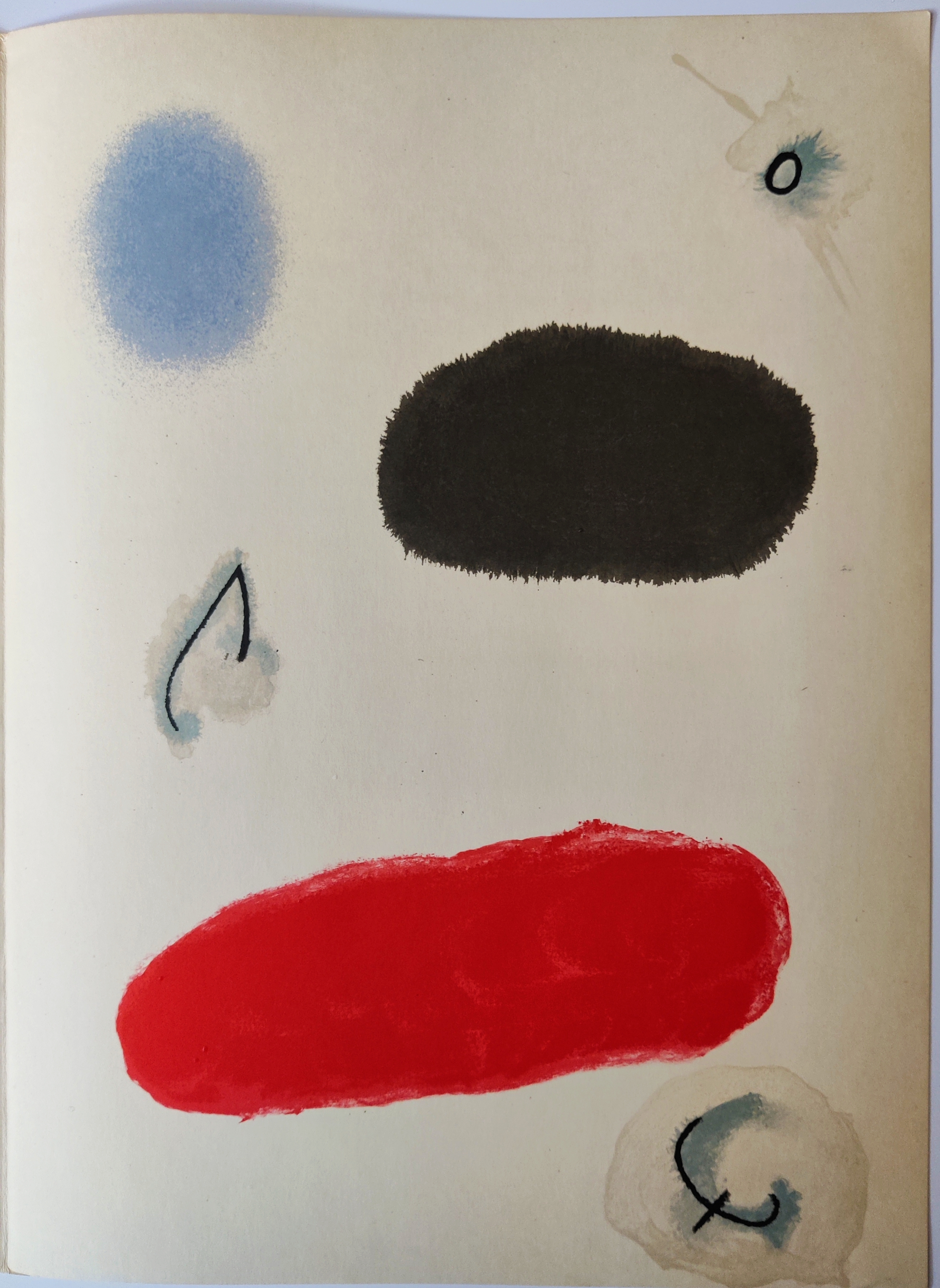 A book with a drawing of a face on it.