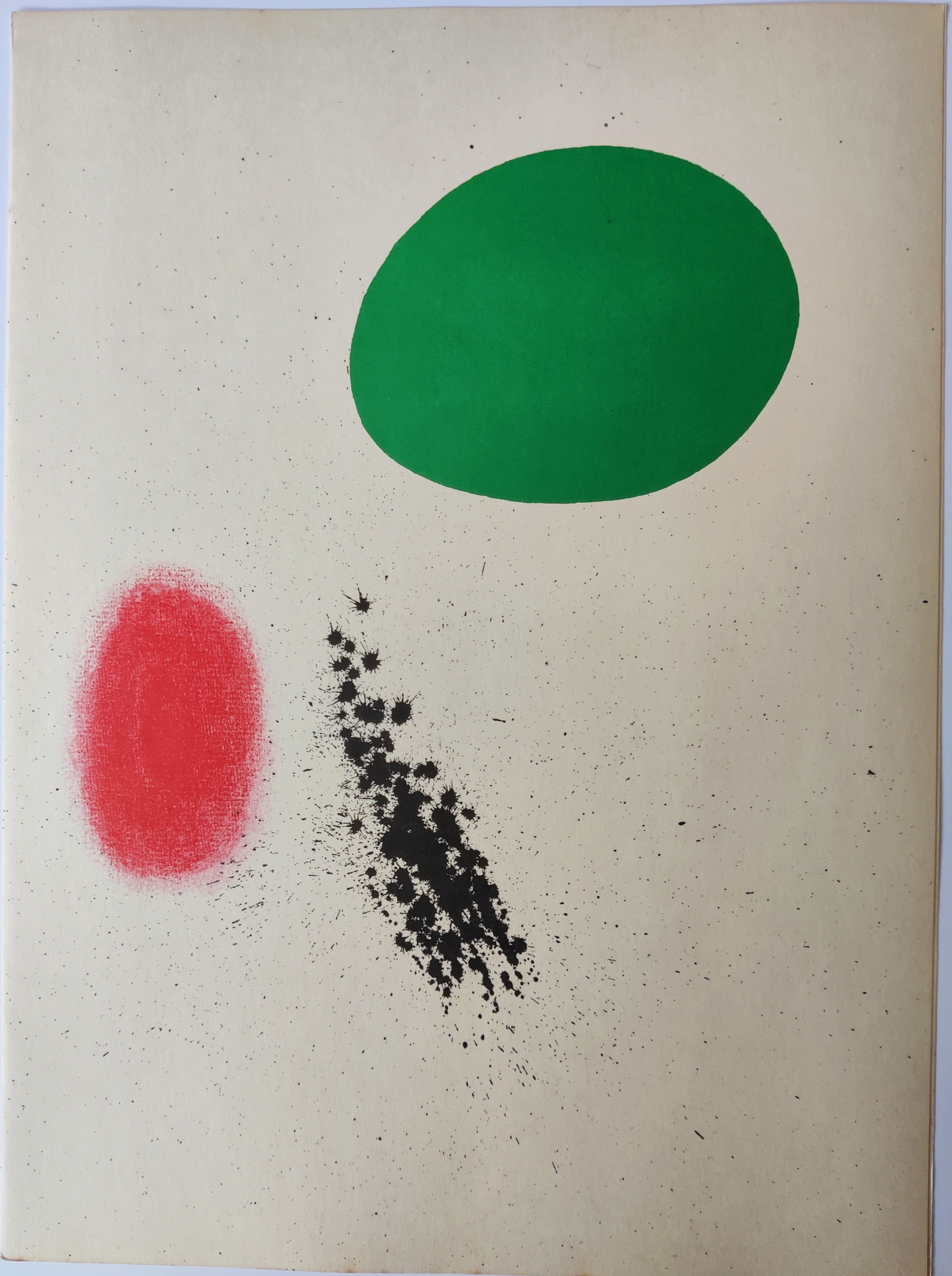 A green and red painting on a white wall.