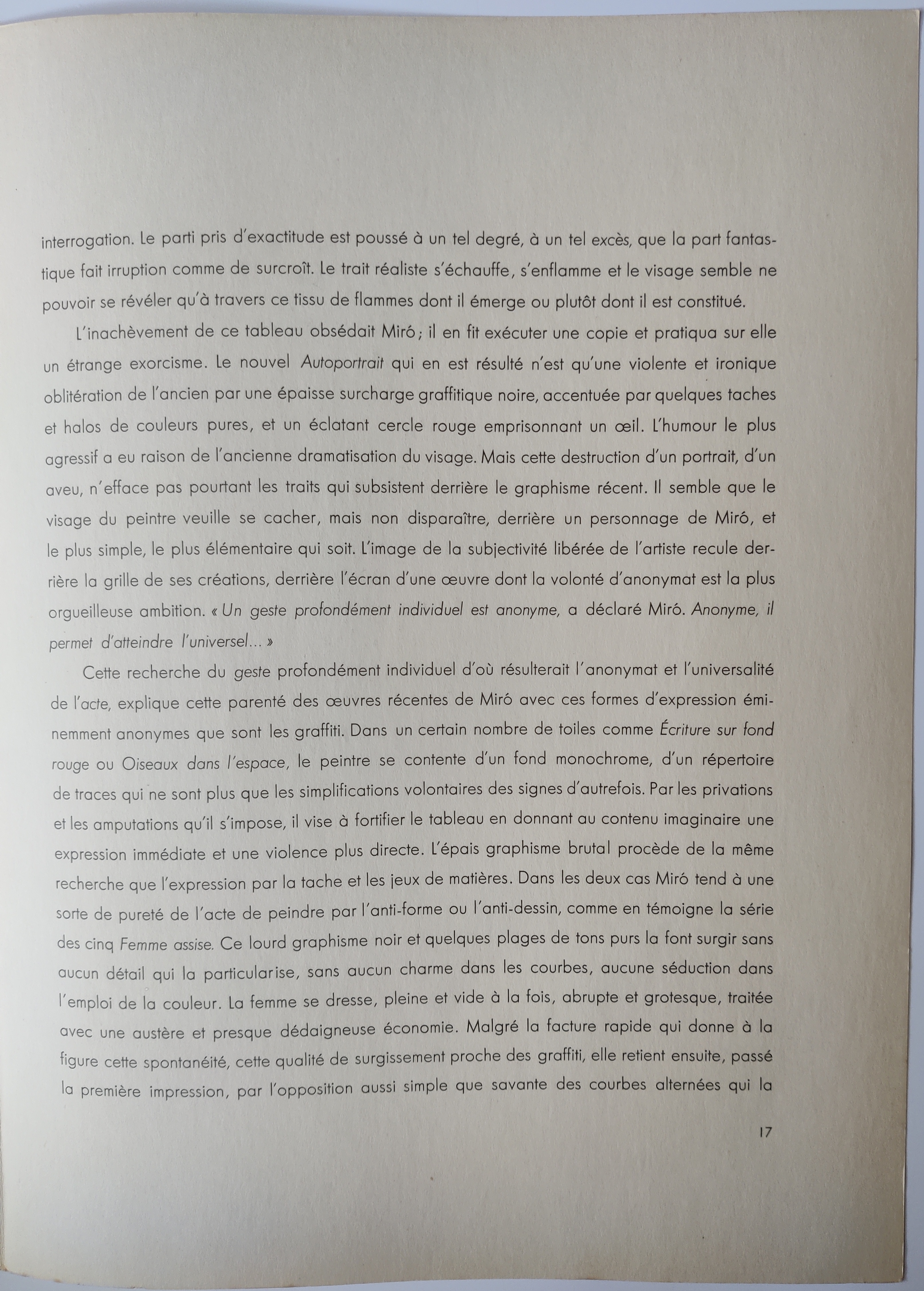 A blue and orange painting on a white wall.