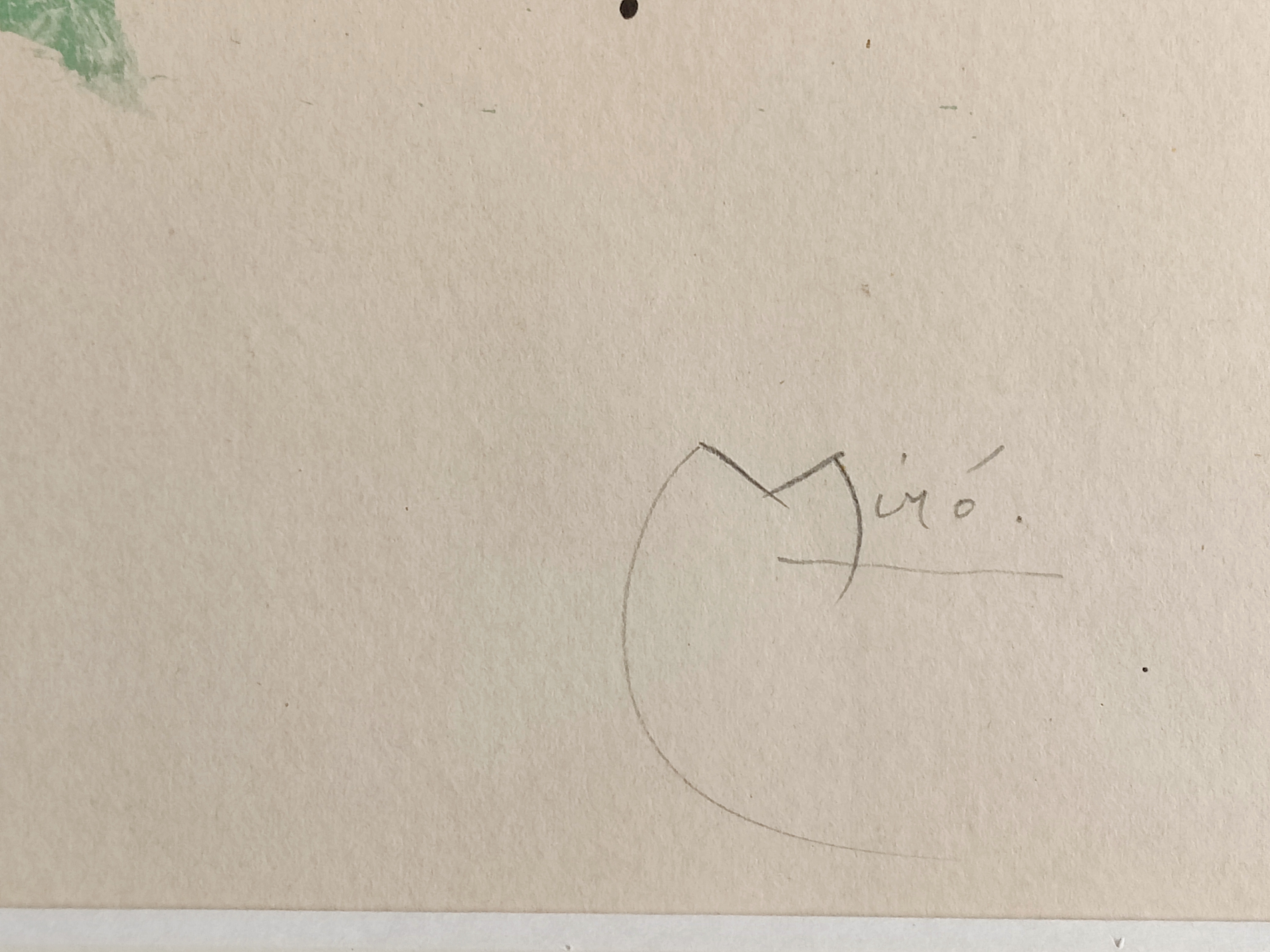 A framed painting of a colorful abstract painting in a gold frame.