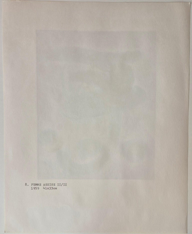 A painting on a piece of paper with a green leaf on it.