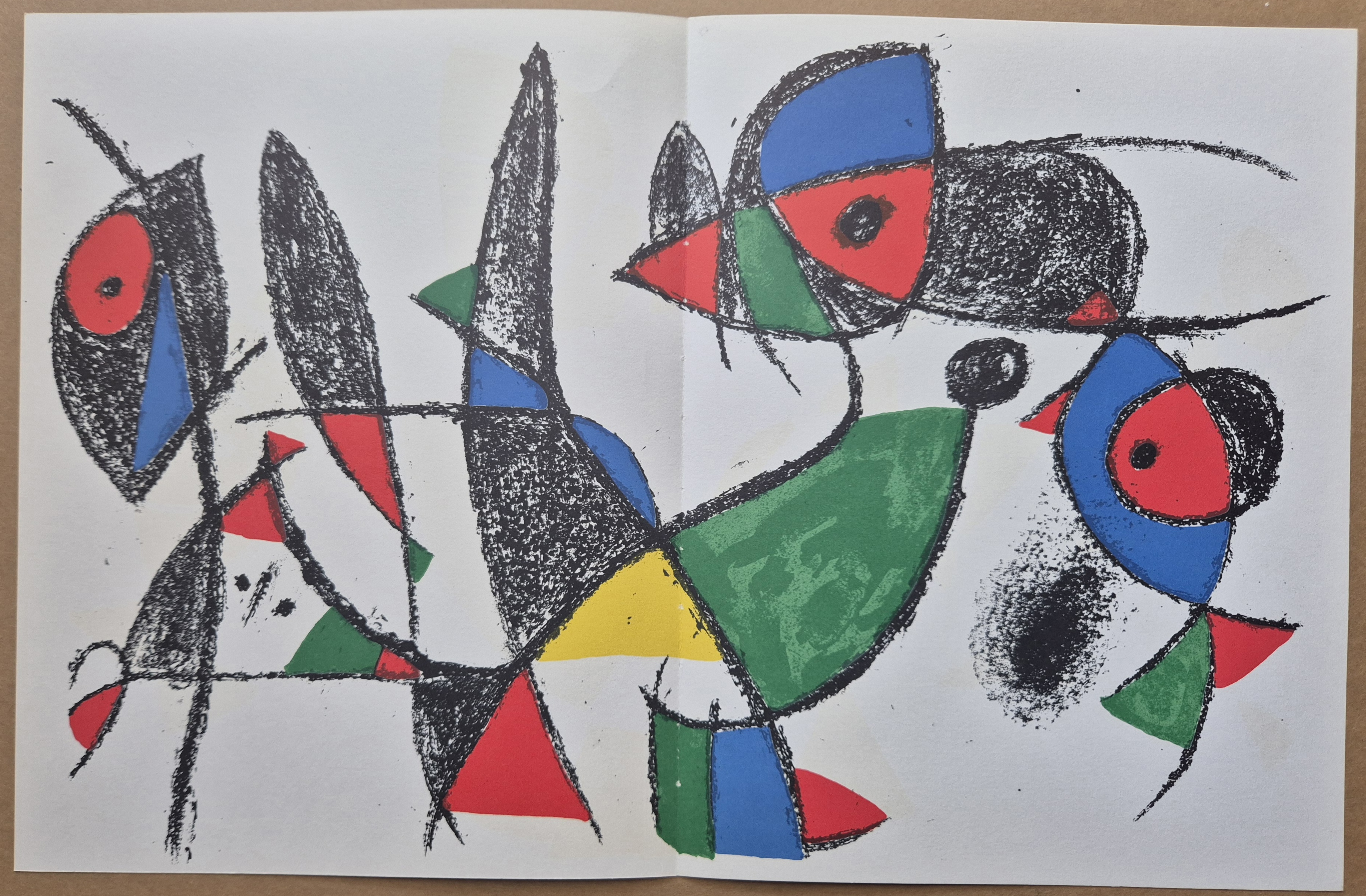 A drawing of a group of abstract shapes on a piece of paper.