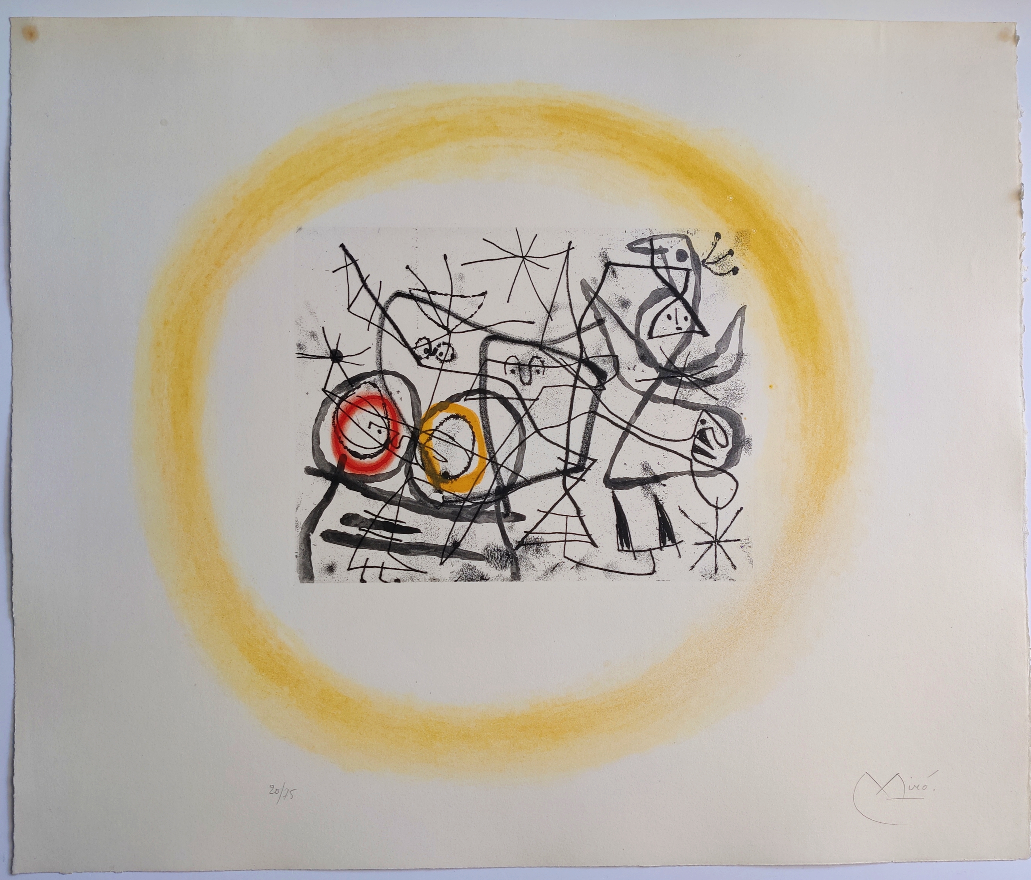 A vibrant graphic print of a café table with a large orange spiral object and a French flag.