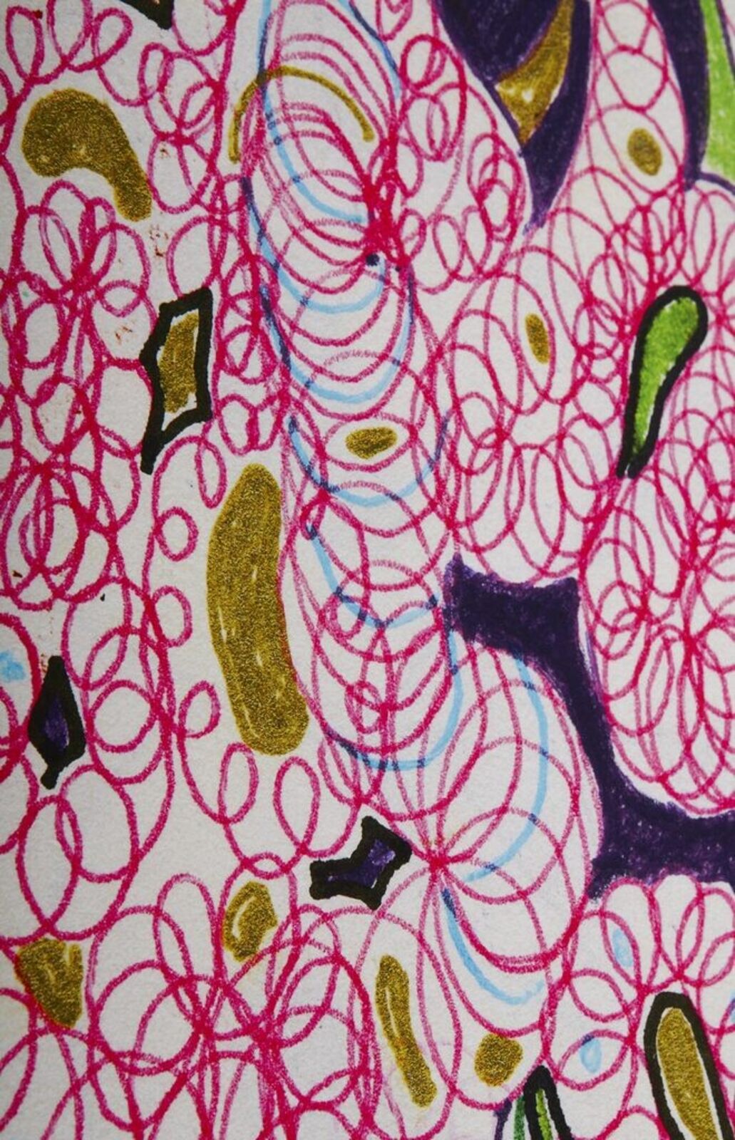 A woman standing in front of a painting on a wall.