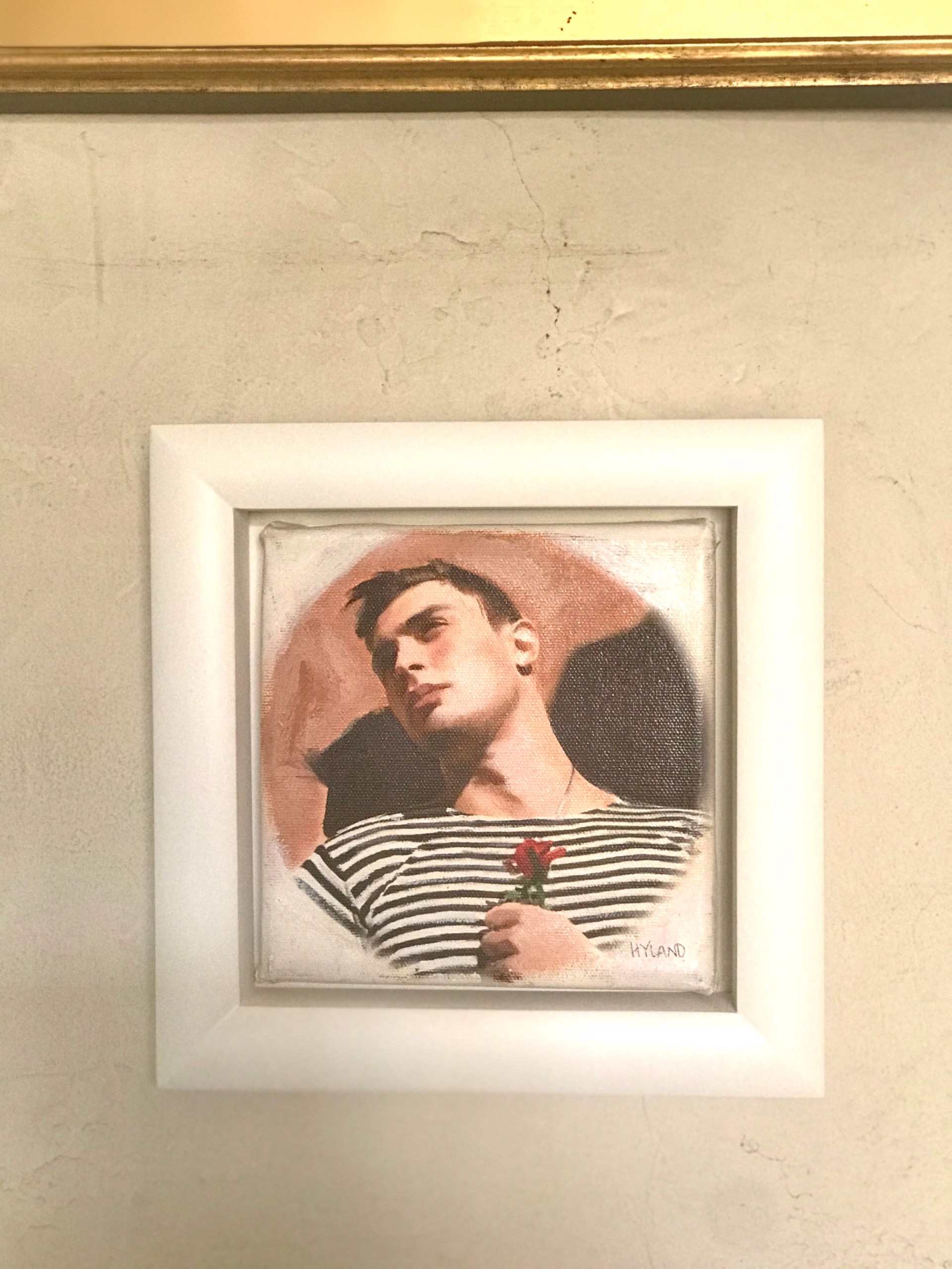 A painting of a man holding a rose in his hand.
