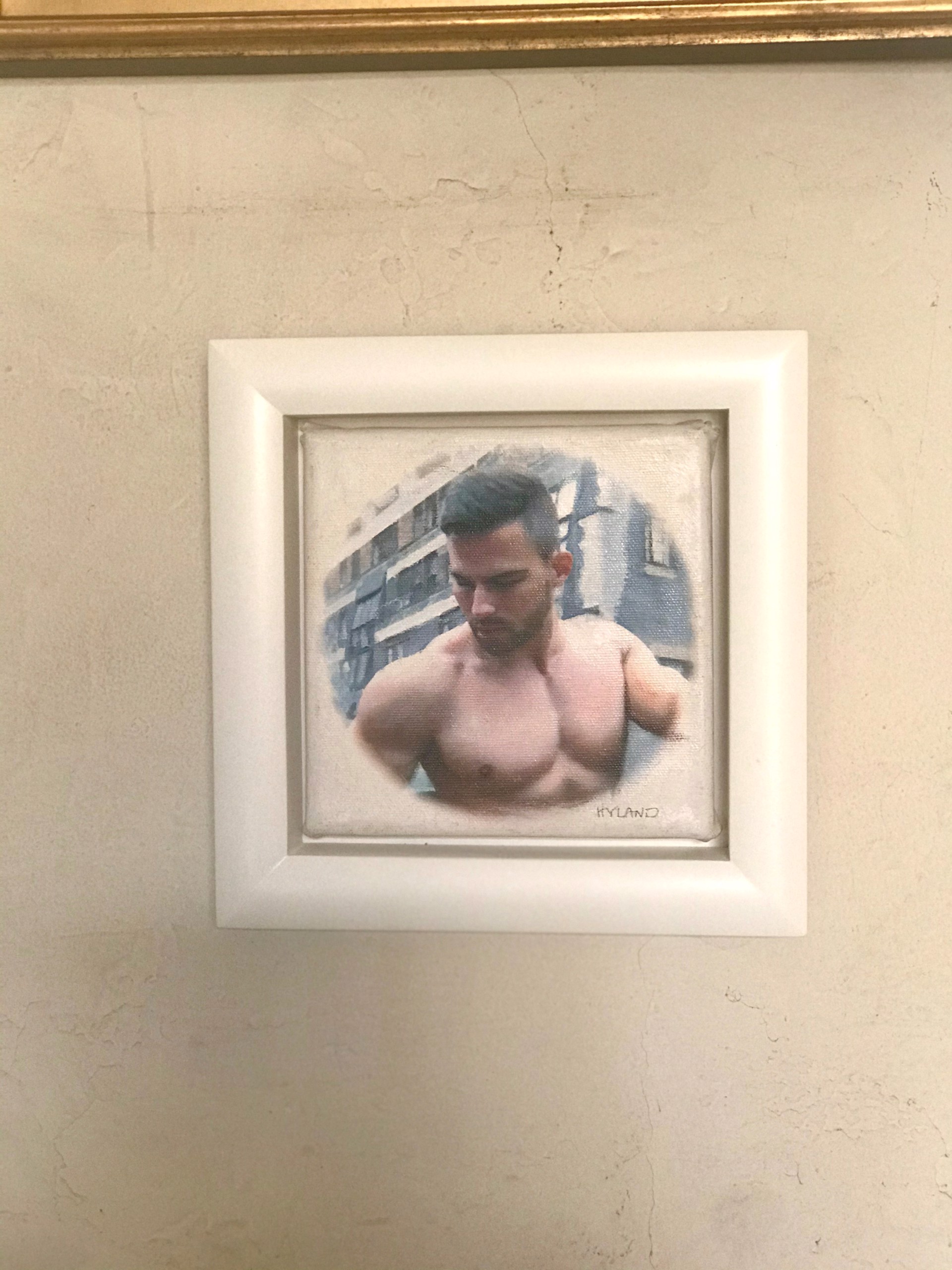 A painting of a shirtless man in front of a building.