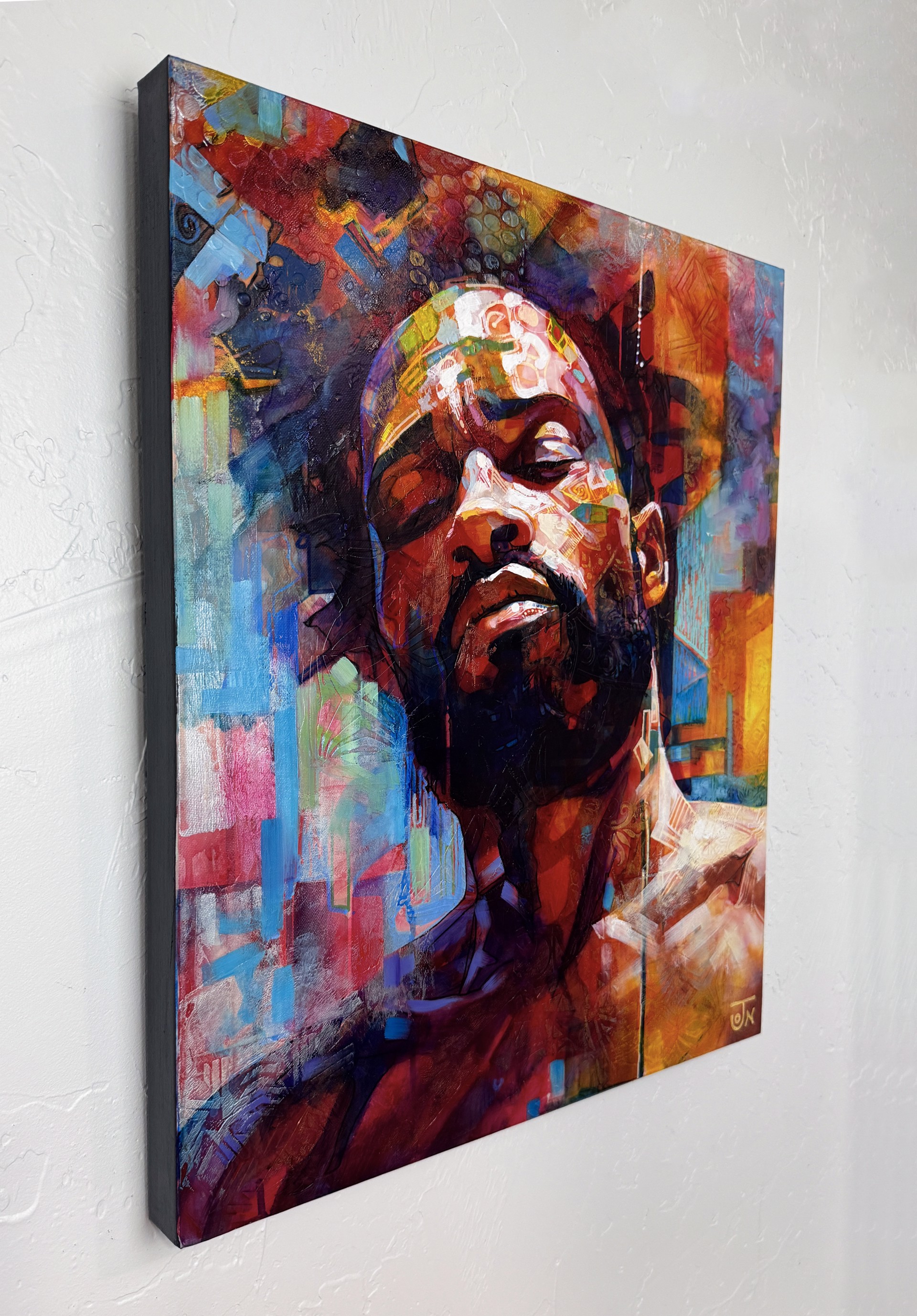 A painting of a man with his eyes closed and his head tilted to the side.