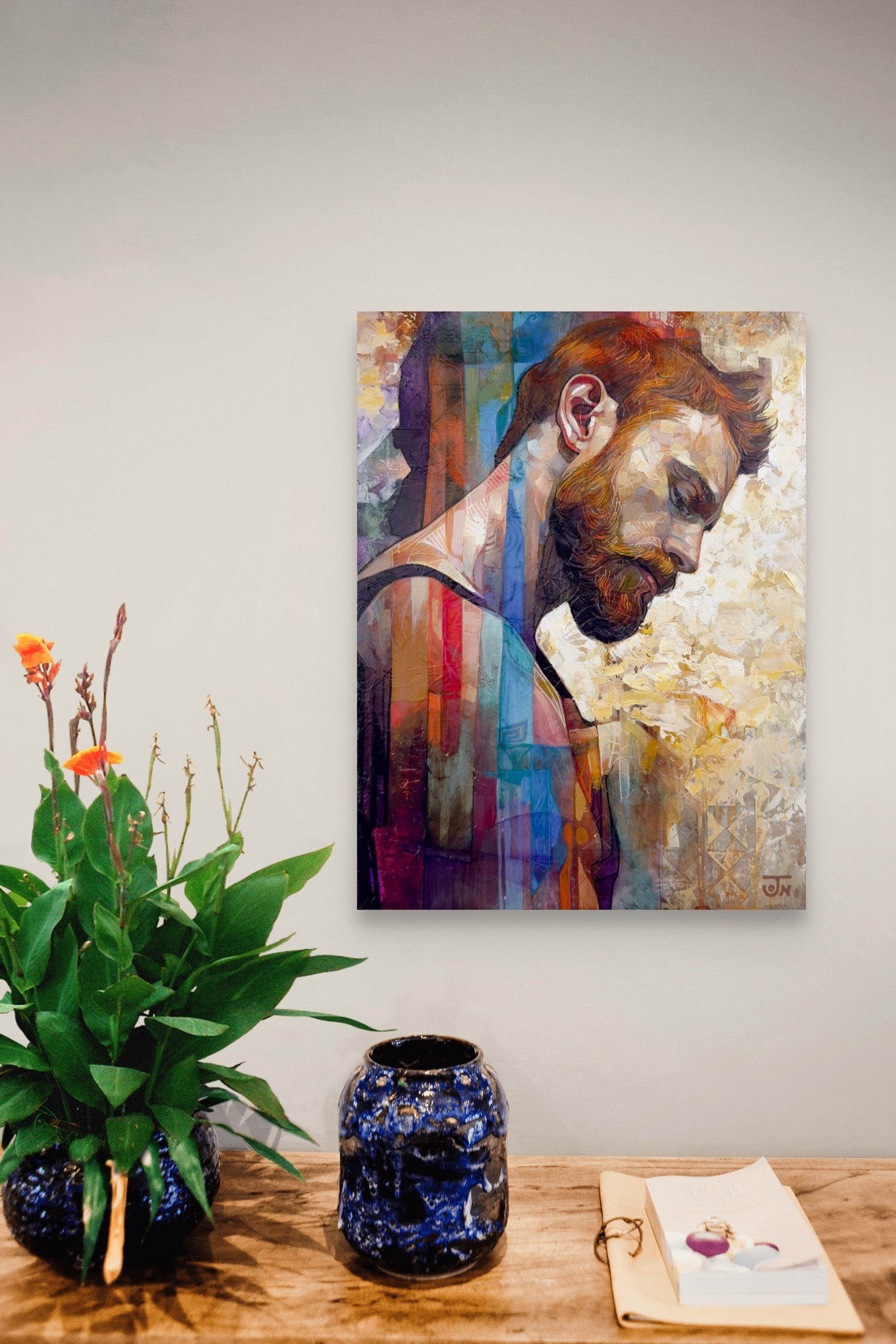 A contemplative portrait of a bearded figure rendered in textured, layered brushstrokes.