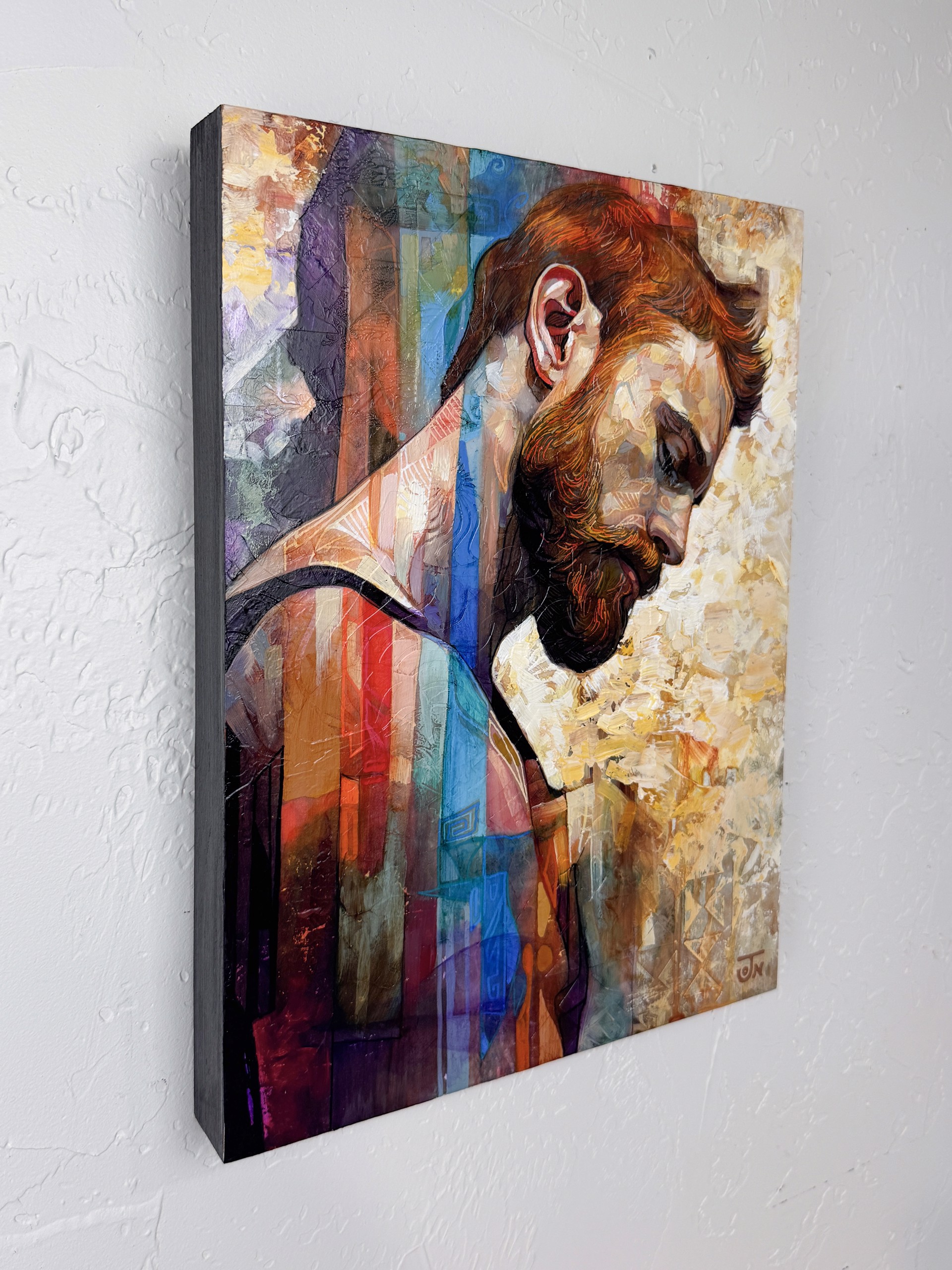 A contemplative portrait of a bearded figure rendered in textured, layered brushstrokes.