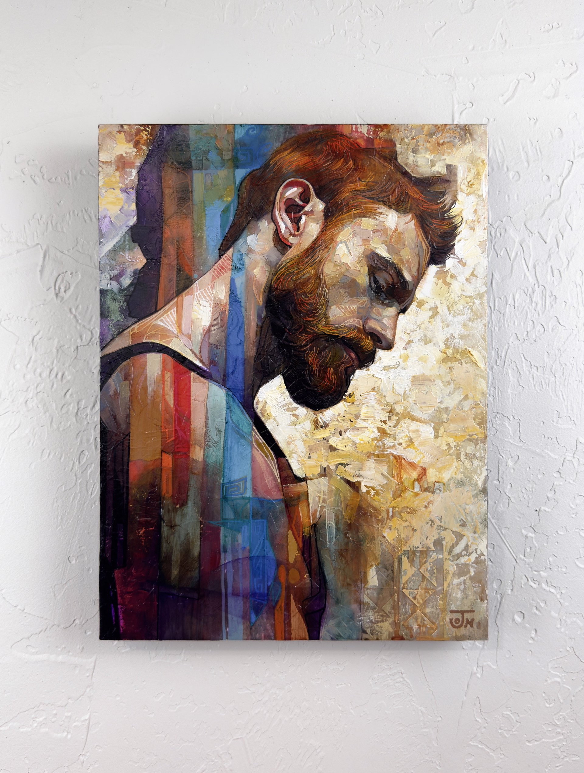 A contemplative portrait of a bearded figure rendered in textured, layered brushstrokes.