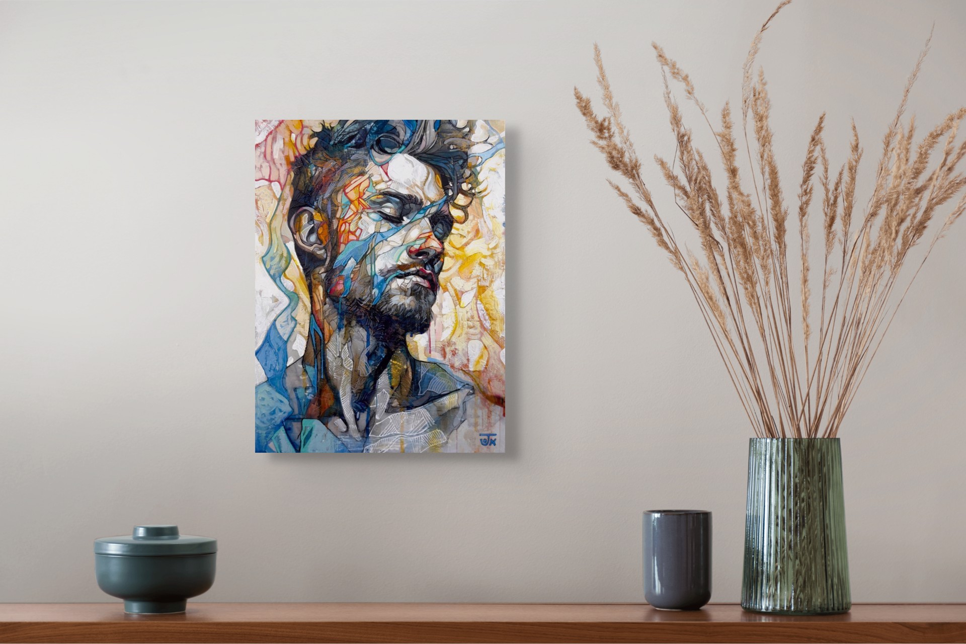 A portrait of a bearded figure with a fragmented, abstract face against a vibrant background.