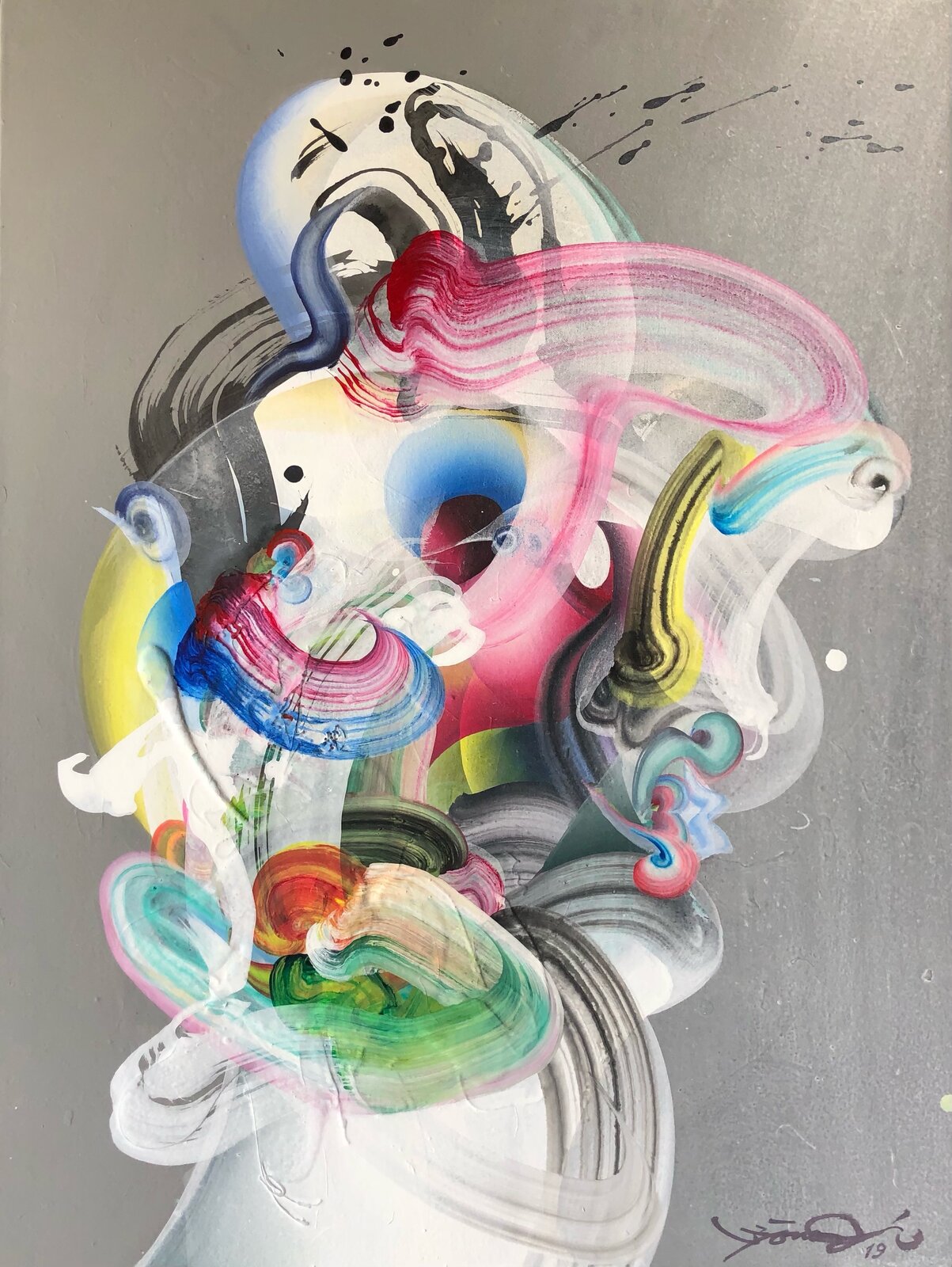 A painting of a woman's face with colorful paint splatters.