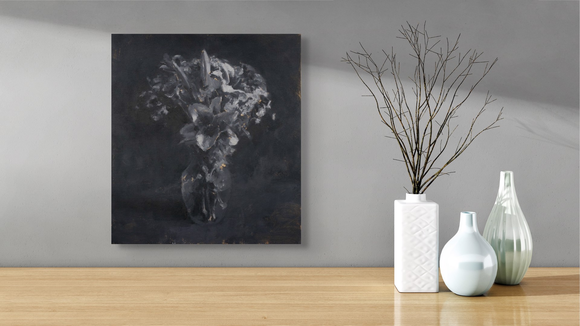 A monochromatic still life of lilies in a vase against a dark background.