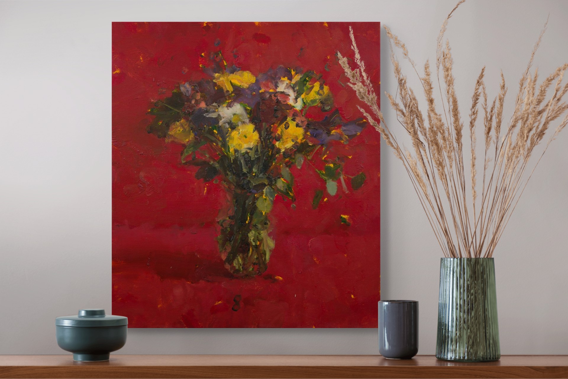 A vibrant still life of a colorful bouquet in a vase against a bold red background.