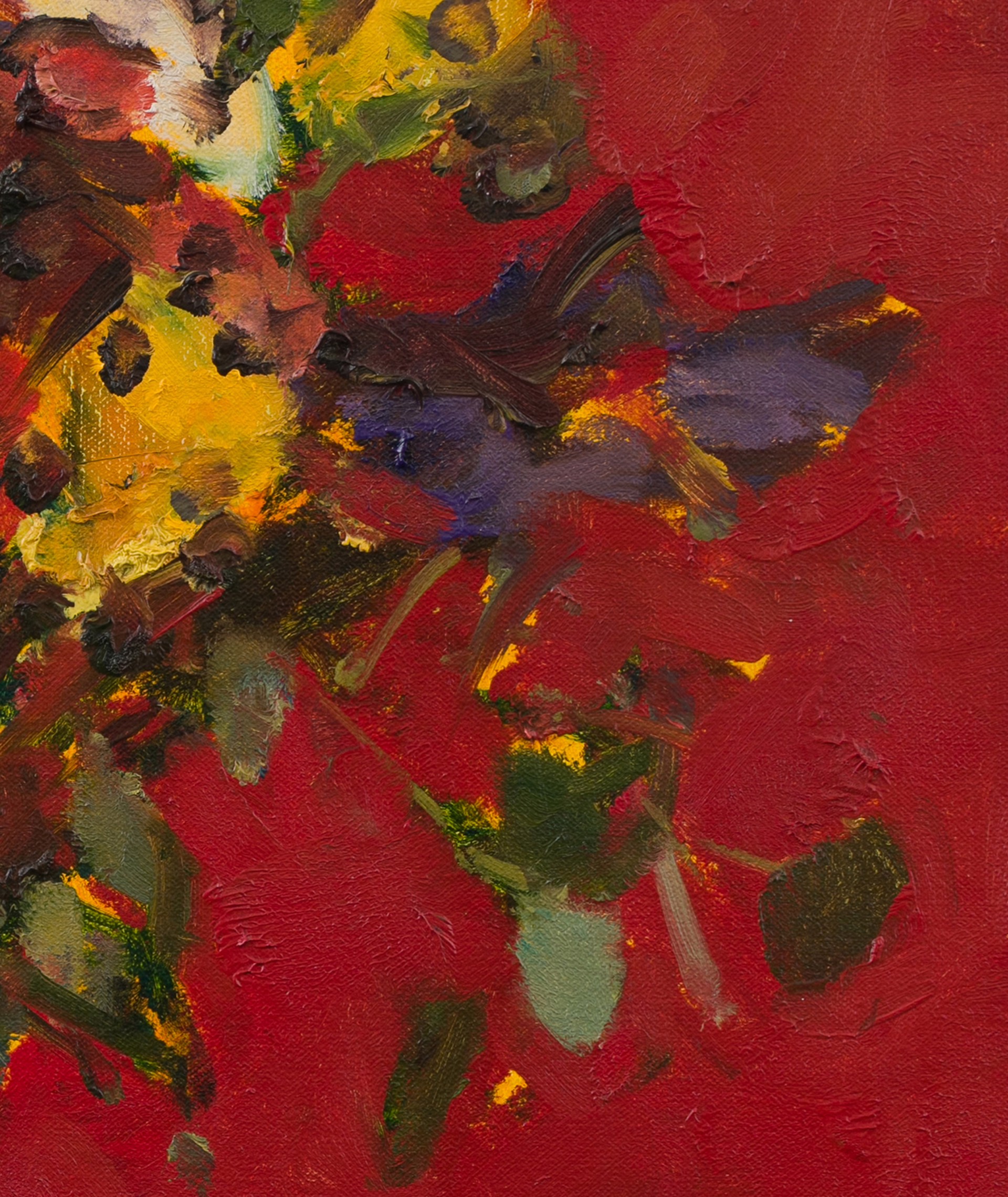 A vibrant still life of a colorful bouquet in a vase against a bold red background.
