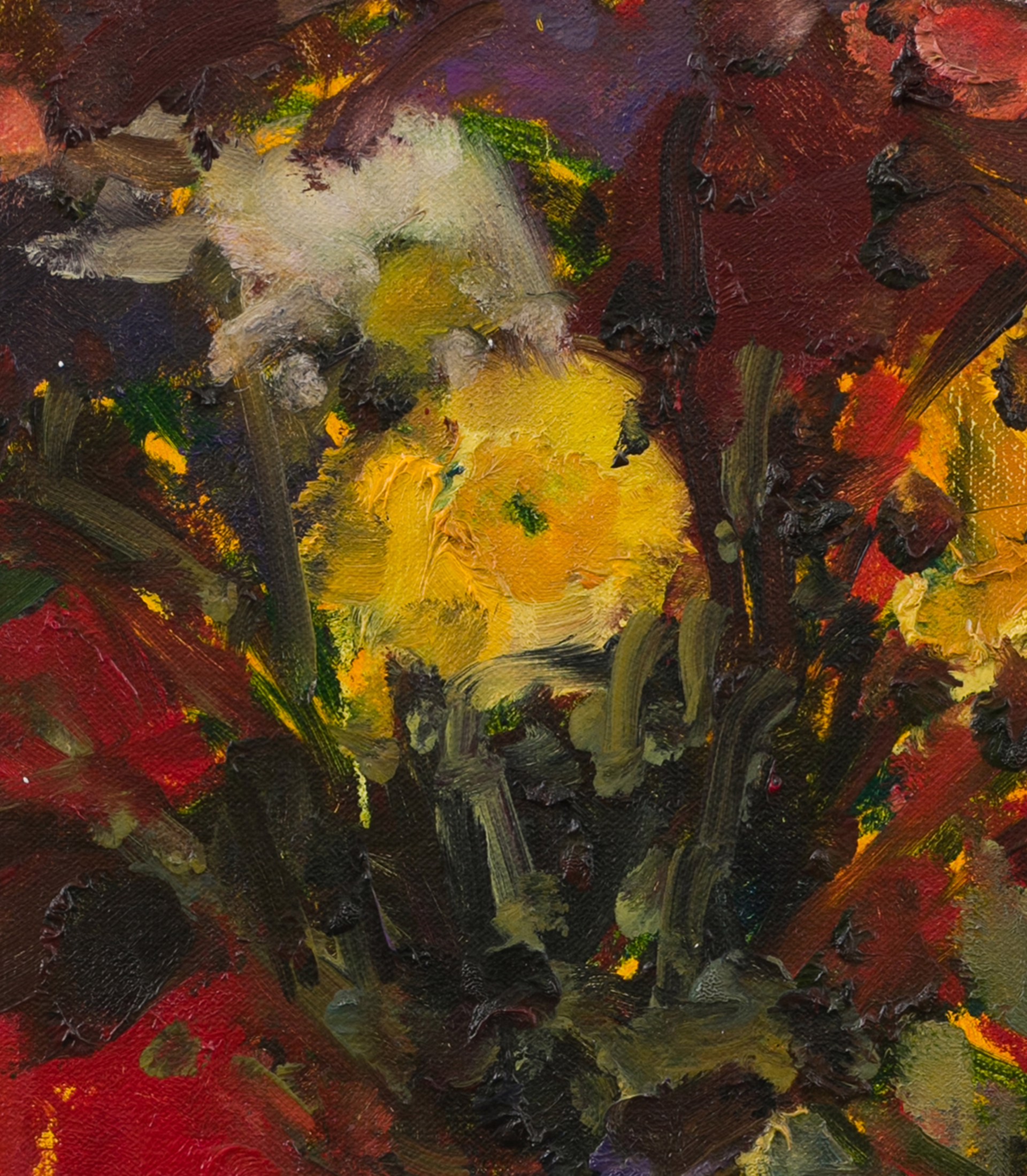A vibrant still life of a colorful bouquet in a vase against a bold red background.