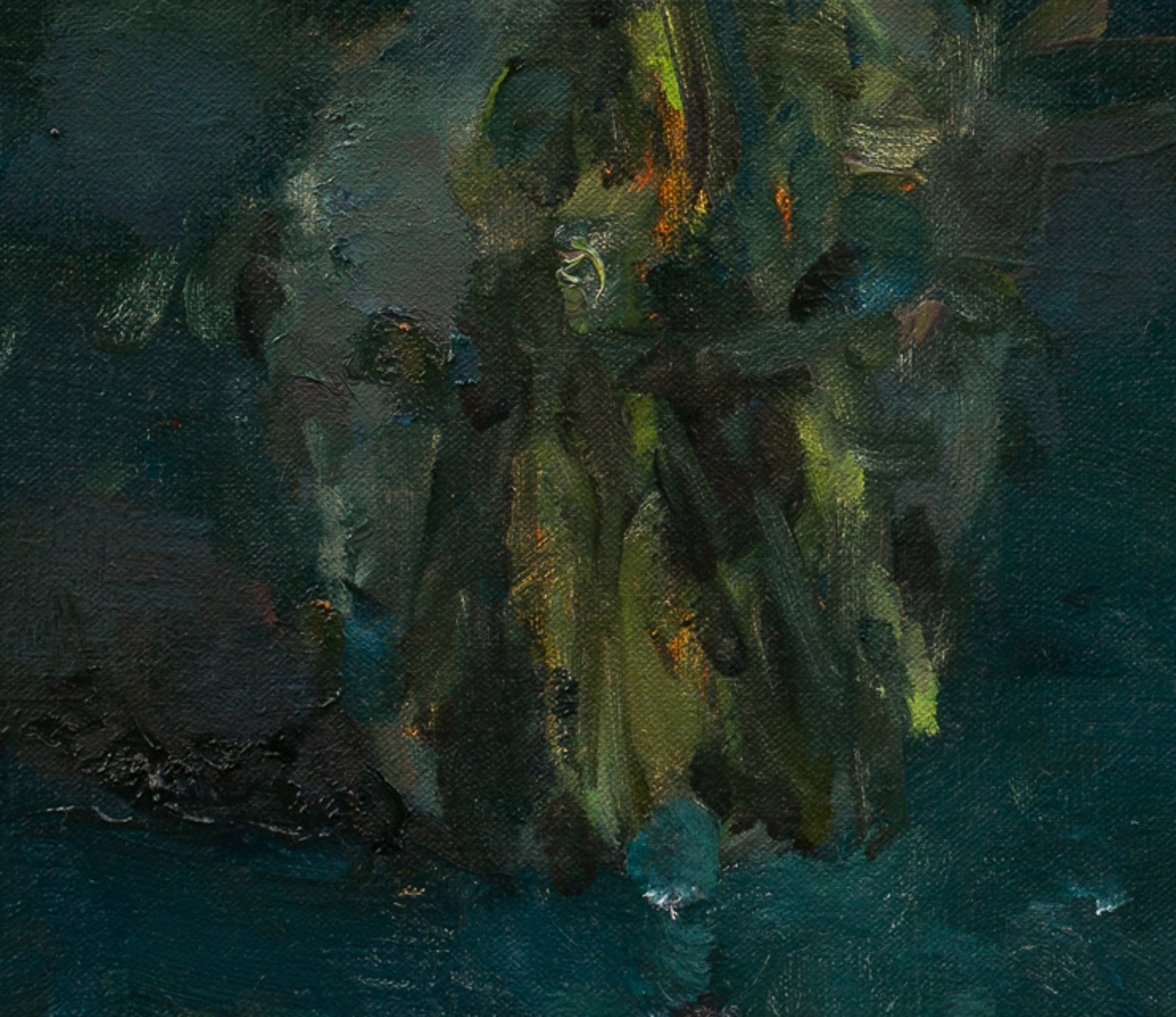 A vibrant bouquet of flowers in a vase against a dark teal background.