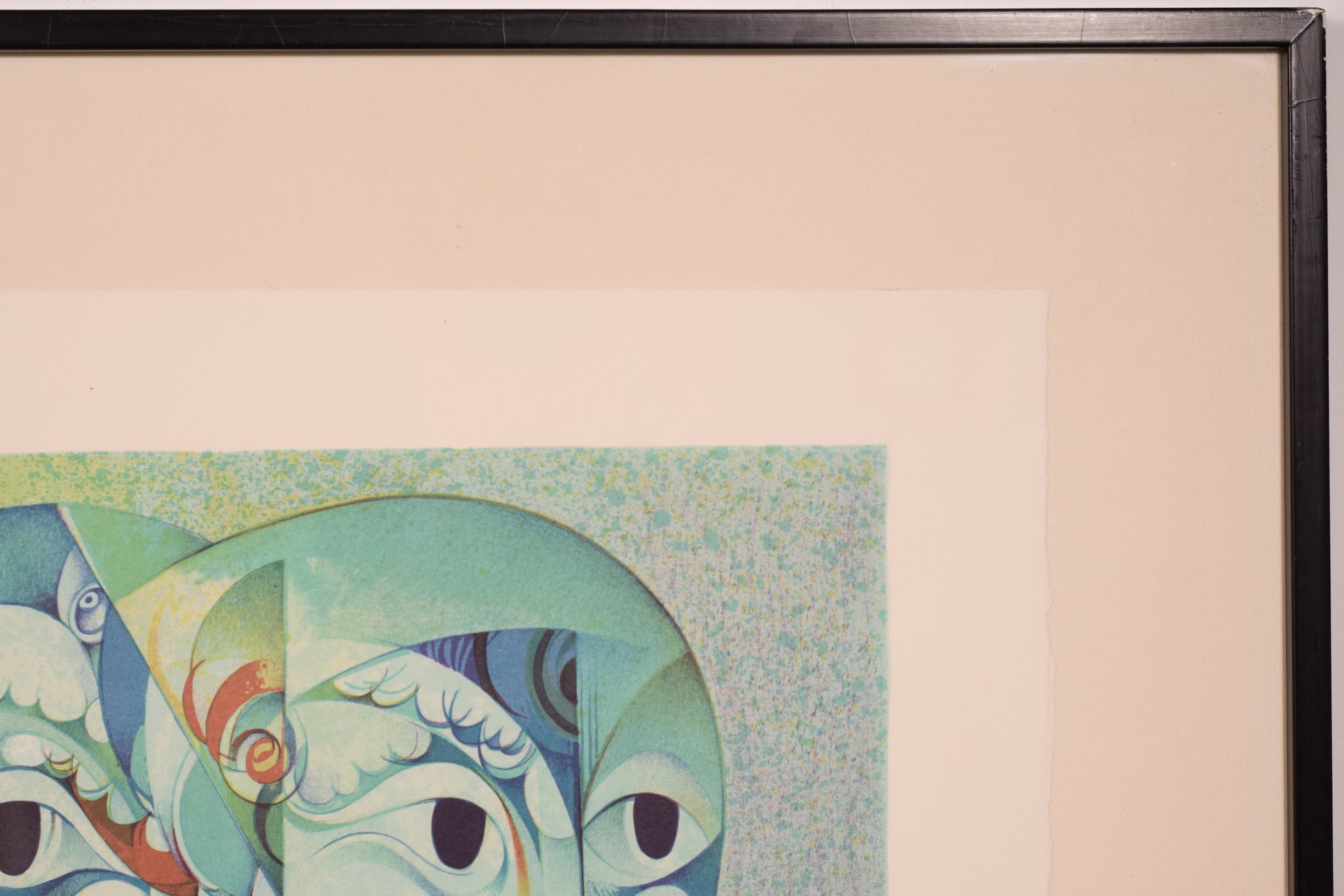 A painting of three faces of a man and a woman.