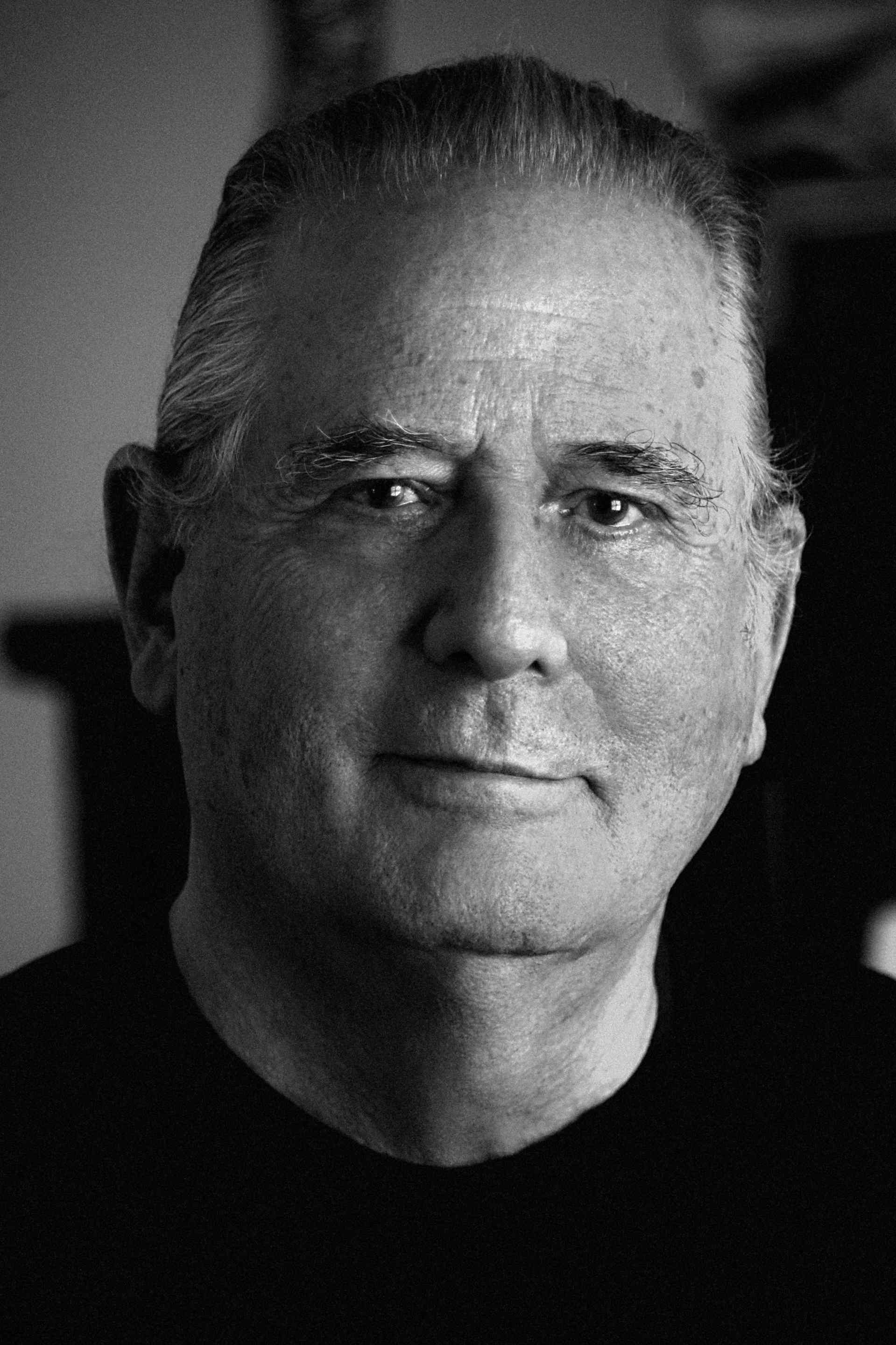 A black and white drawing of a tree in the middle of a forest.