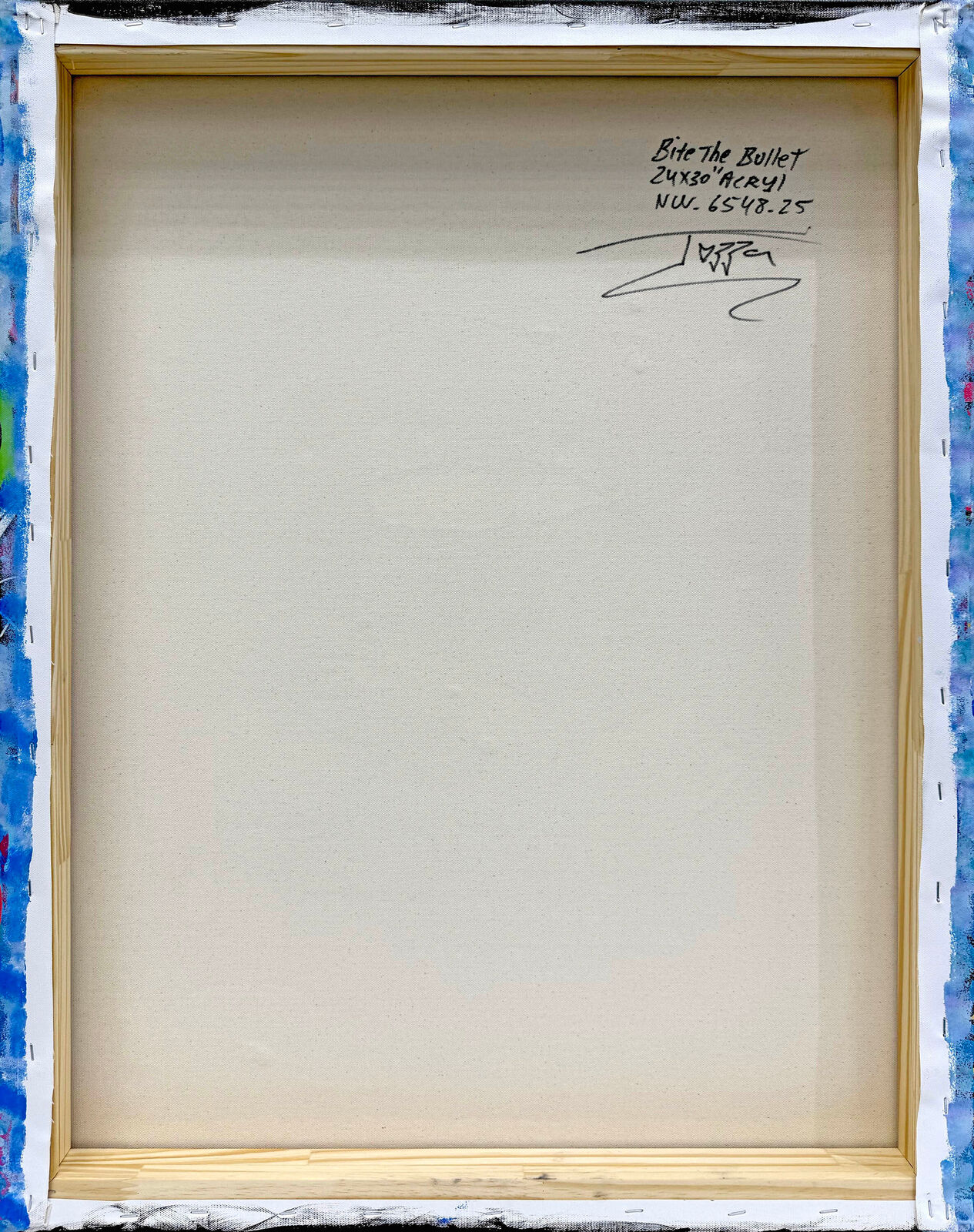 A collage of various cartoon characters on a wall.