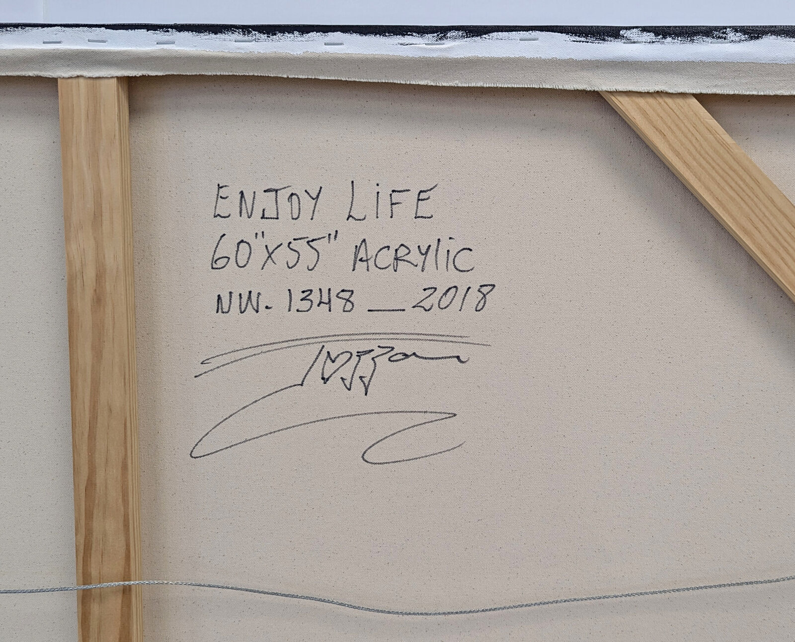 A painting of a yellow heart with the words enjoy life, love, happy, beautiful.