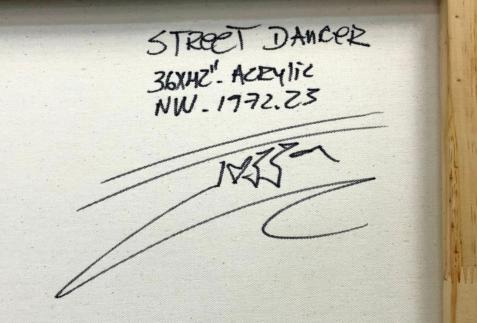 A painting of a woman and a dog in a white frame.