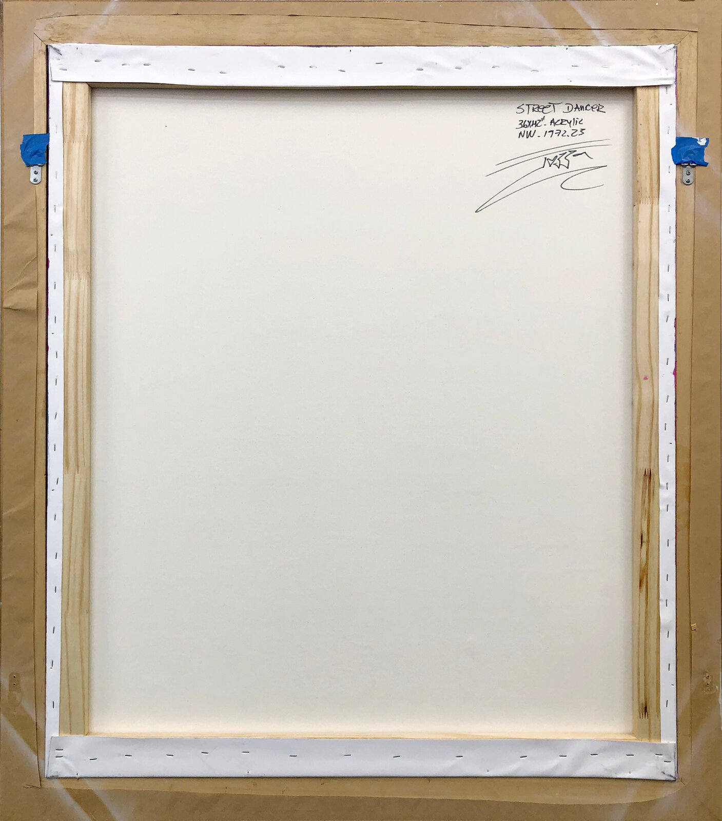 A painting of a woman and a dog in a white frame.