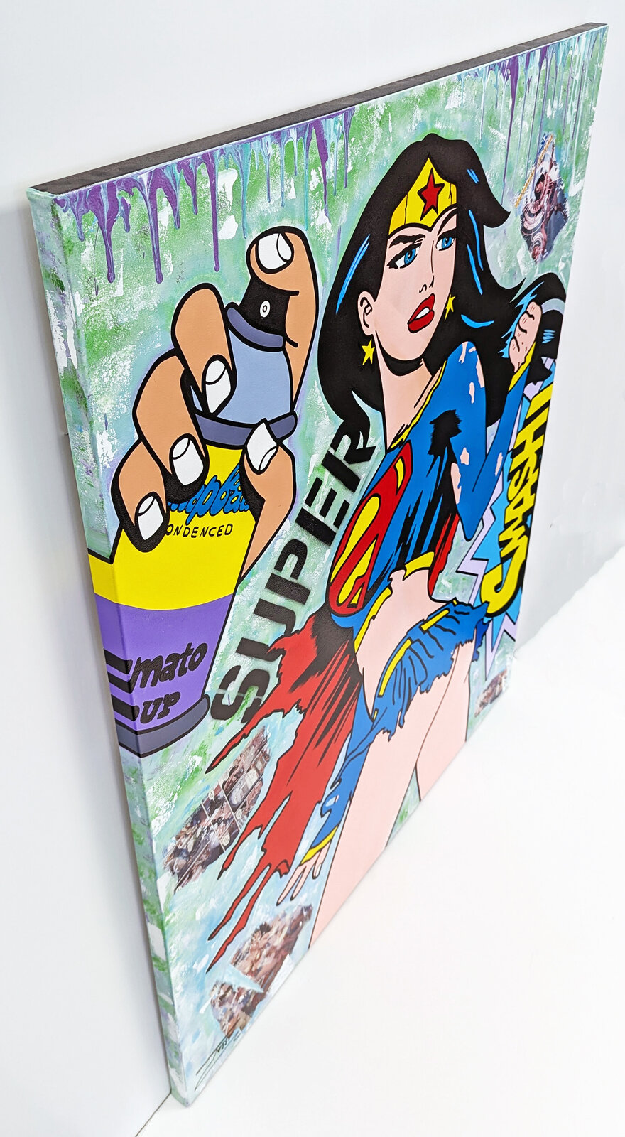 A painting of a woman in a superman costume holding a spray can.