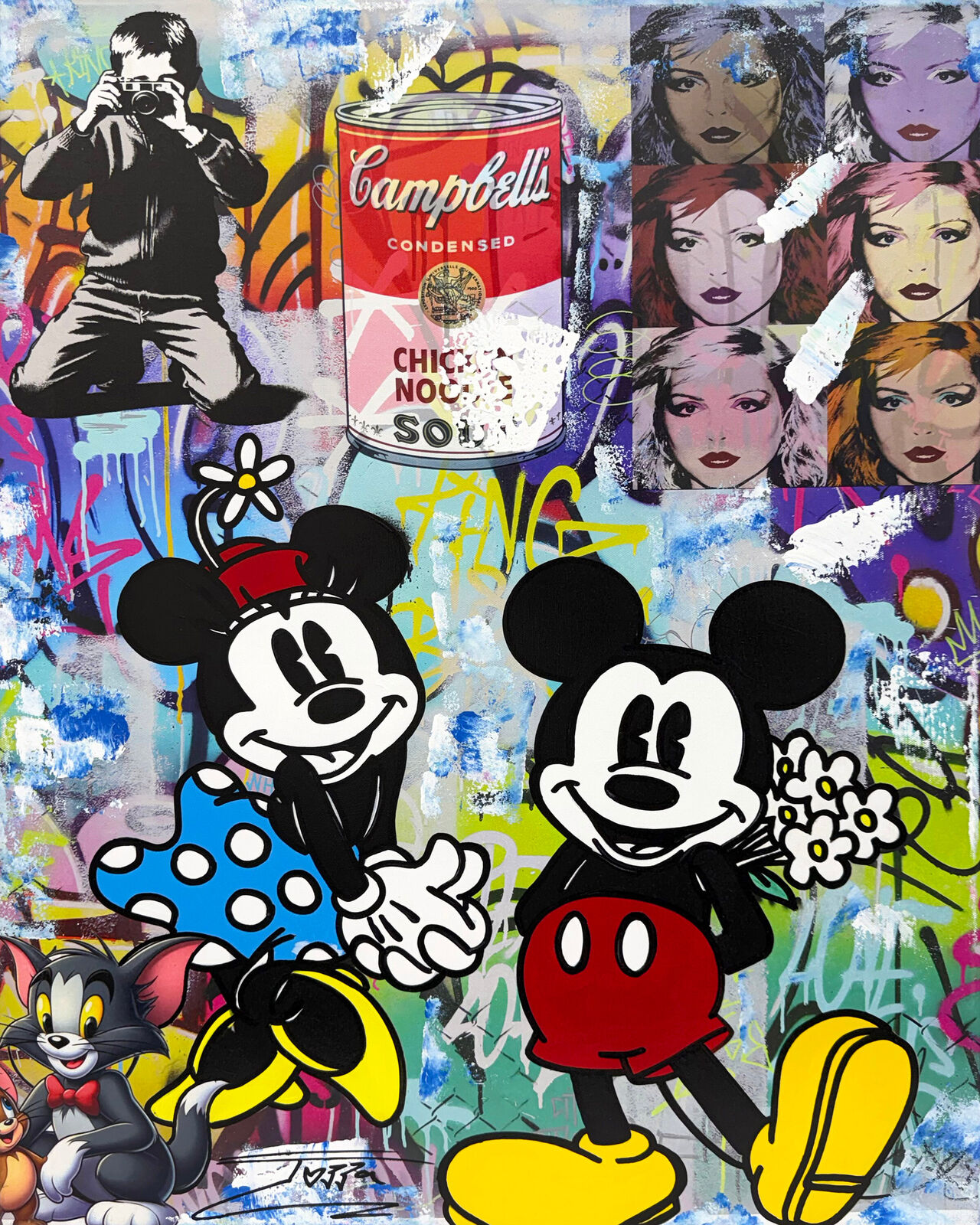 A painting of Mickey Mouse and other cartoon characters on a wall.