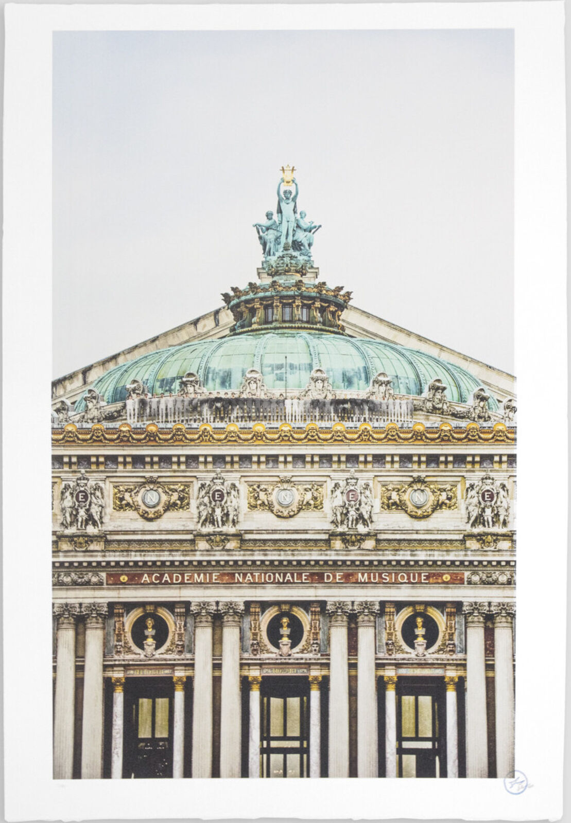 A picture of a building with a statue on top of it.