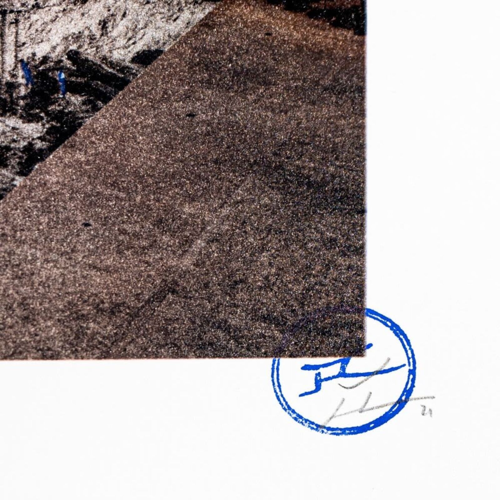 A group of people standing in front of a pyramid.