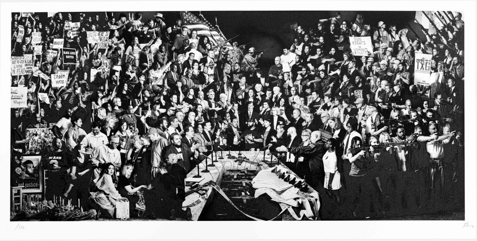 A large crowd of people standing around a table in front of a crowd.