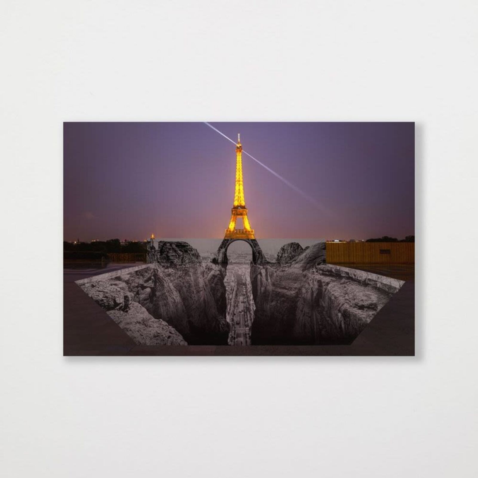 A picture of the Eiffel Tower in the middle of a desert.