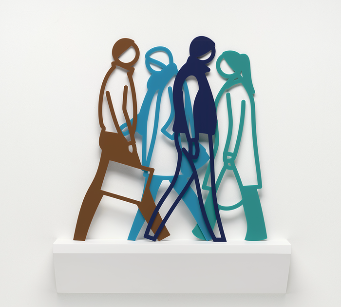 A group of people walking on a white shelf.