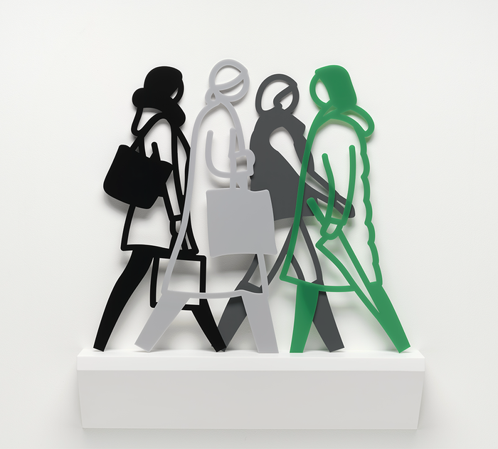 A group of people walking on a white shelf.