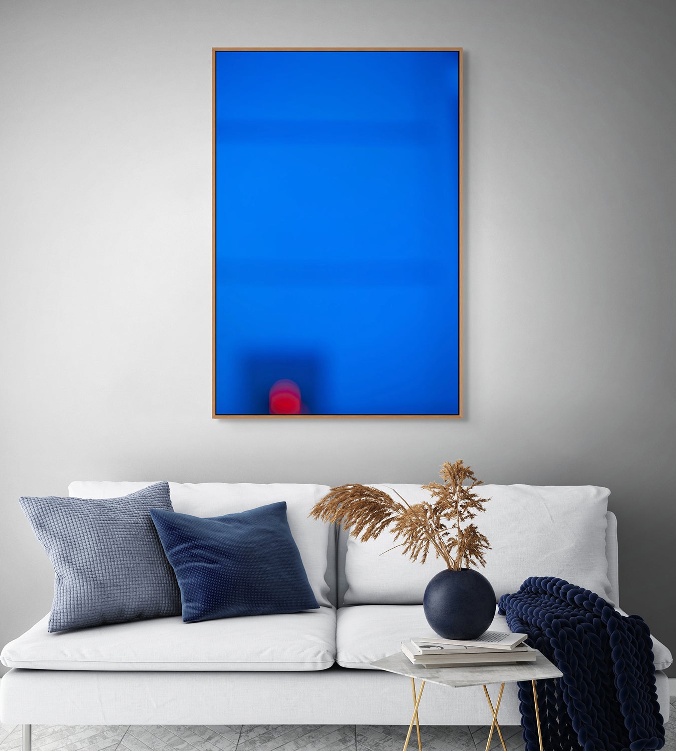 A blurry image of a red ball in the middle of a blue background.