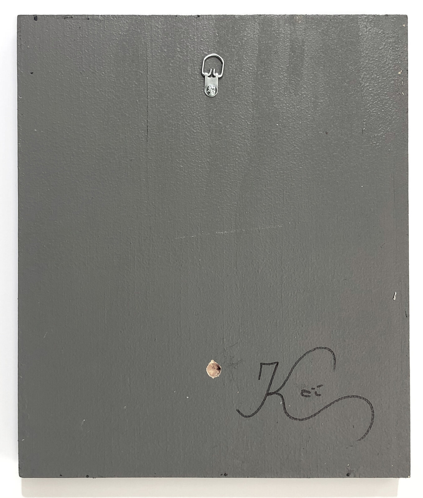 A picture of a cell phone with a sad face on it.