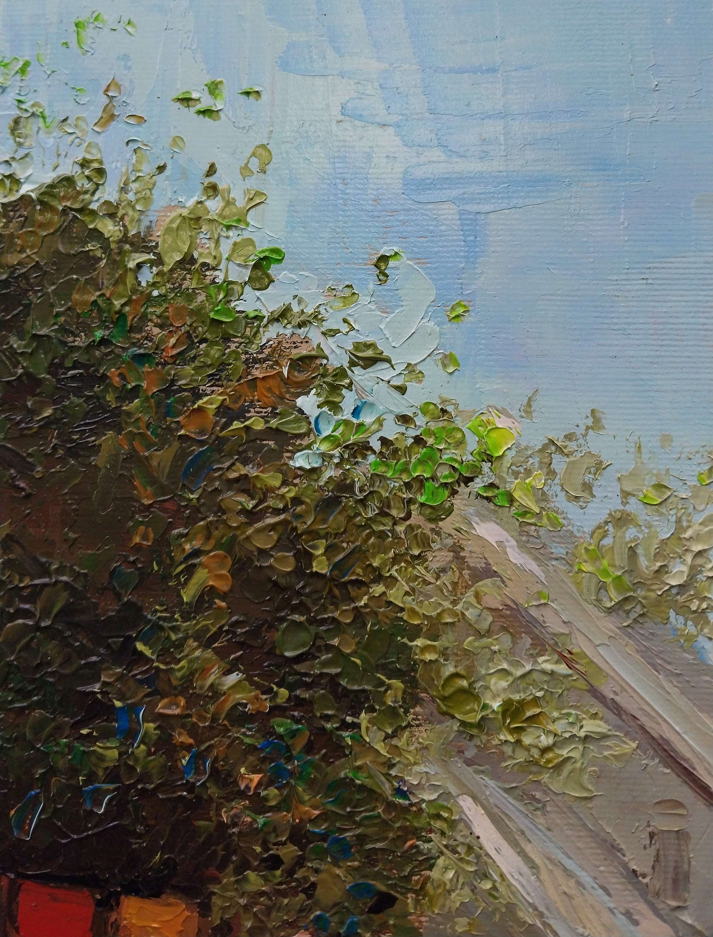 A textured oil painting of a quiet, misty street corner with a red building and green foliage.
