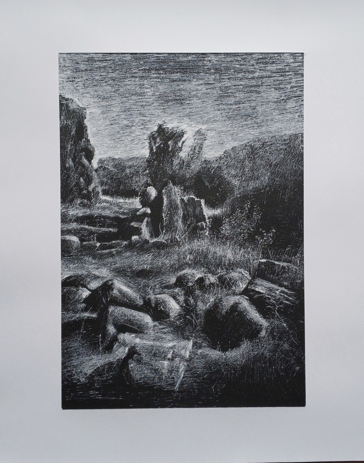 A black and white drawing of rocks by the water.