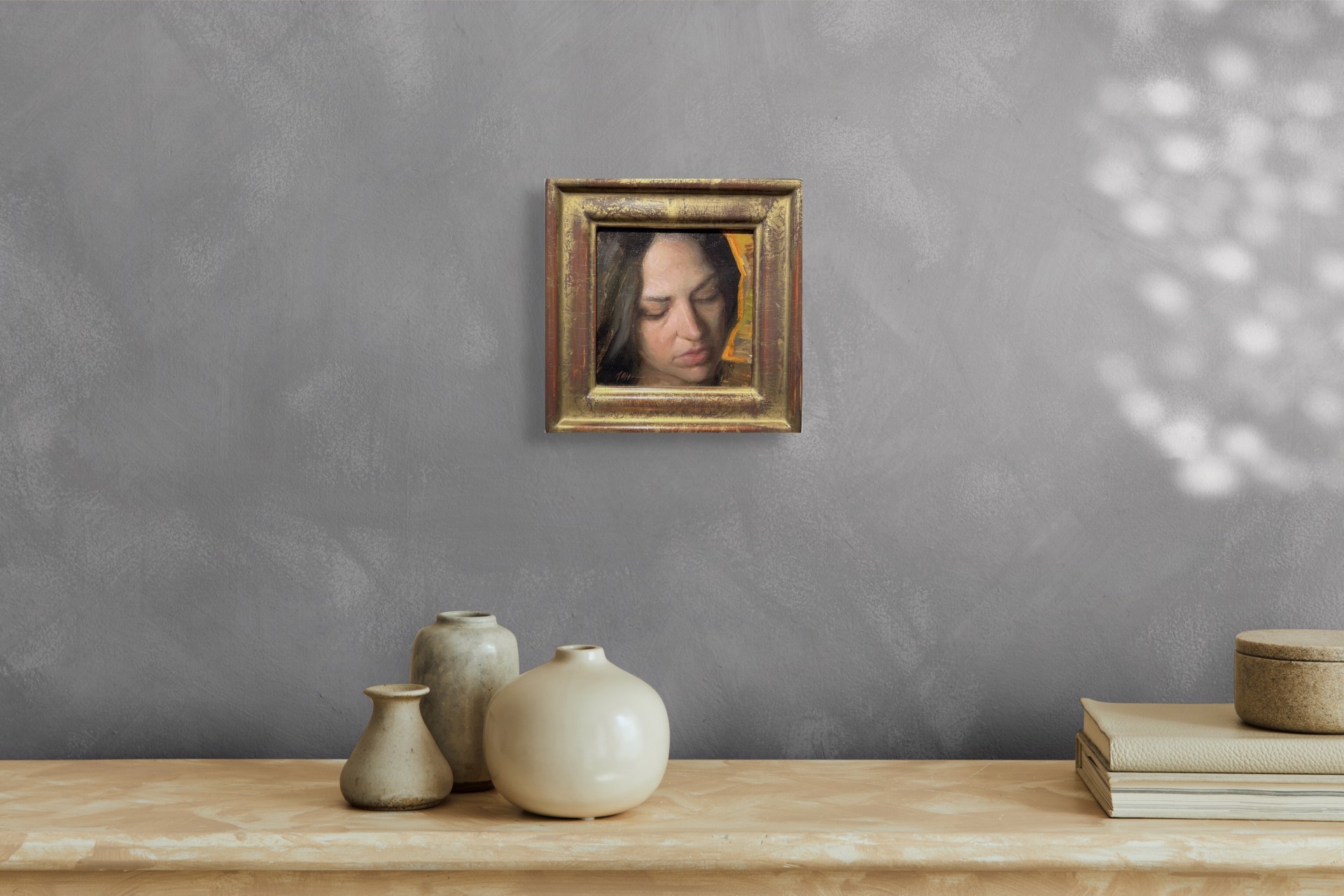 A painting of a woman with her eyes closed. 