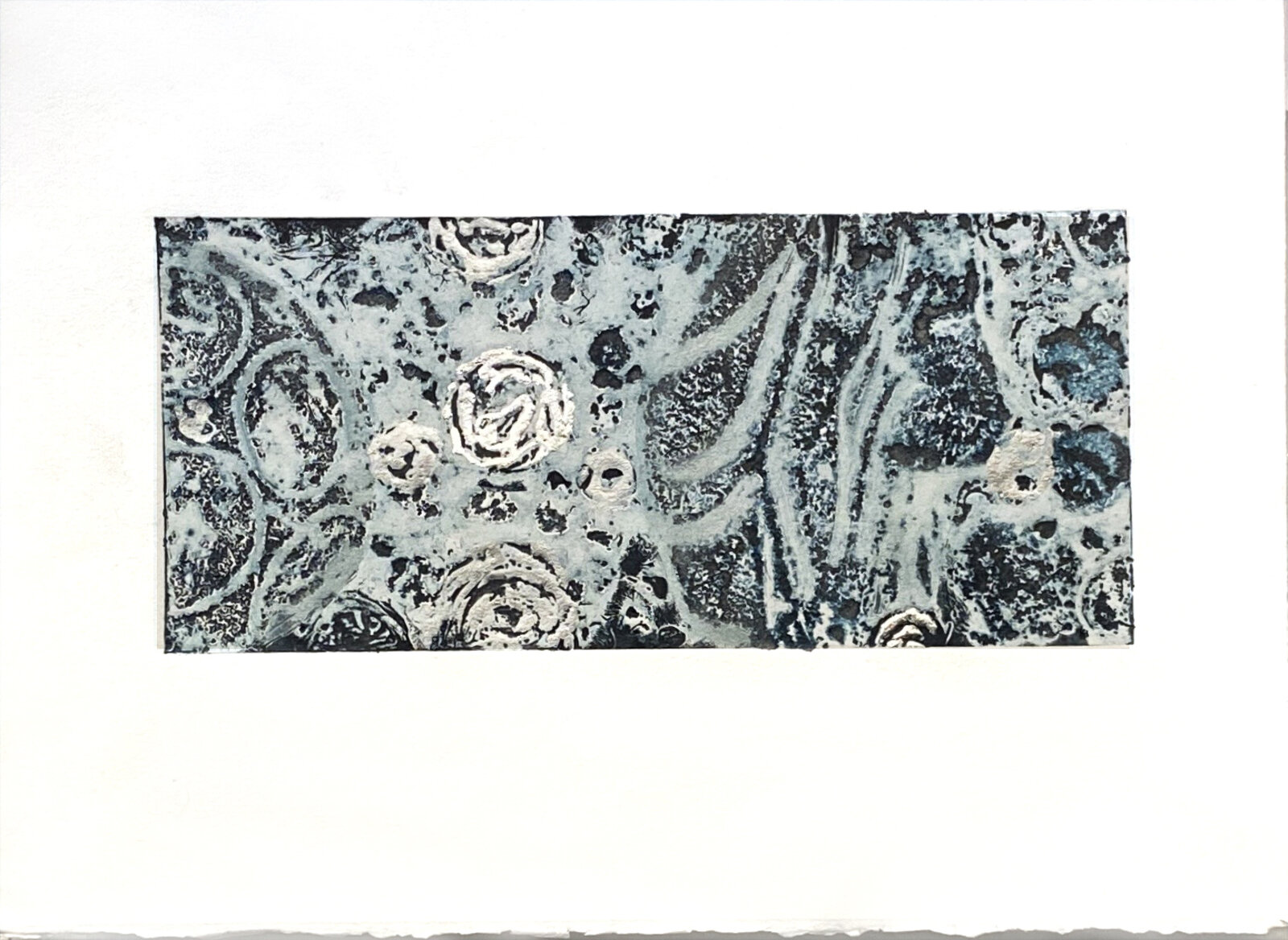 A black and white drawing of a pattern on a piece of paper.