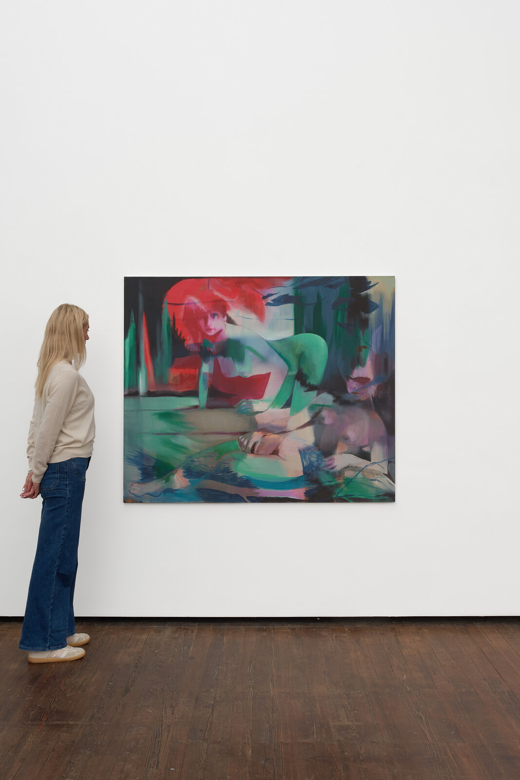 A dreamlike painting featuring a figure in green leaning over another person, set against a surreal background of red and dark tones.